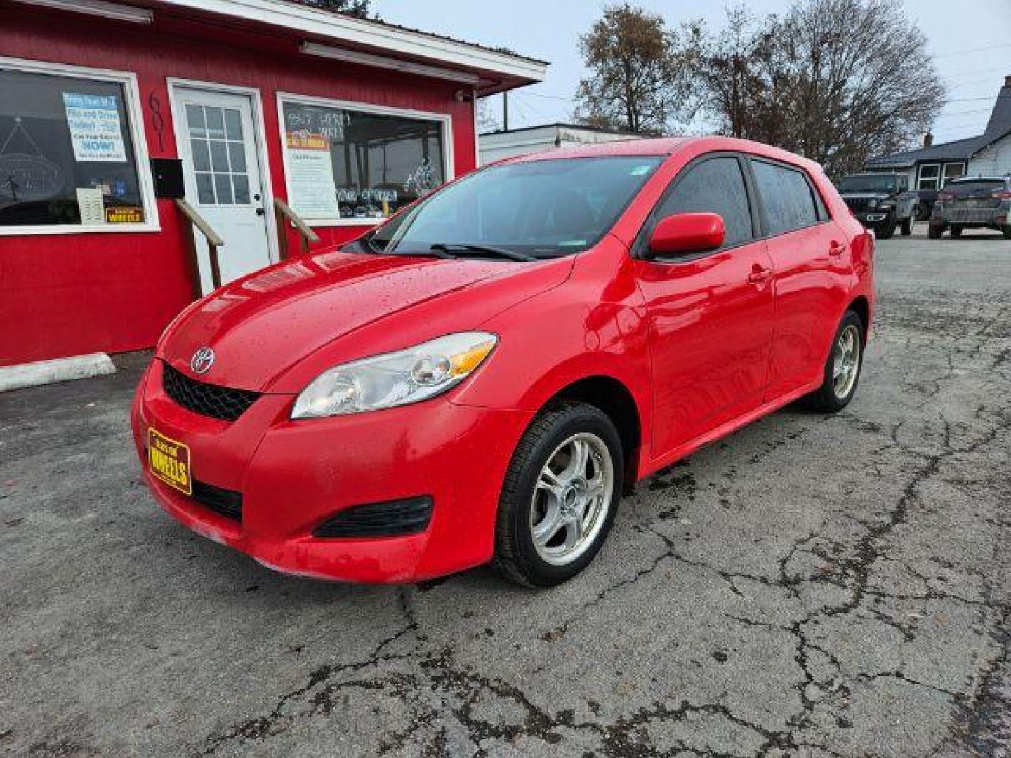 2009 Radiant Red Toyota Matrix Base 5-Speed MT (2T1KU40E09C) with an 1.8L L4 DOHC 16V engine, 5-Speed Manual transmission, located at 601 E. Idaho St., Kalispell, MT, 59901, 0.000000, 0.000000 - Photo#0