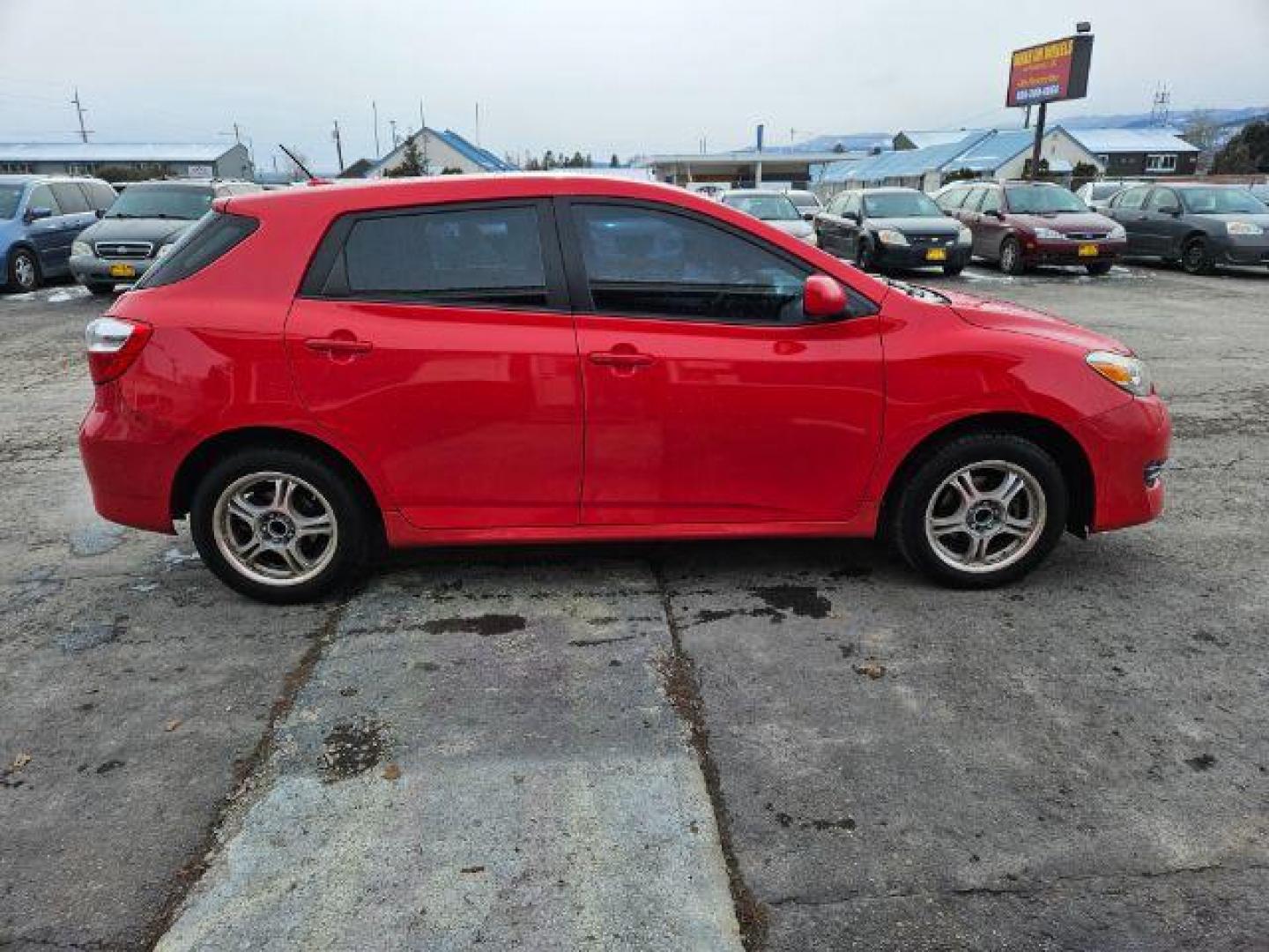 2009 Radiant Red Toyota Matrix Base 5-Speed MT (2T1KU40E09C) with an 1.8L L4 DOHC 16V engine, 5-Speed Manual transmission, located at 601 E. Idaho St., Kalispell, MT, 59901, 0.000000, 0.000000 - Photo#5