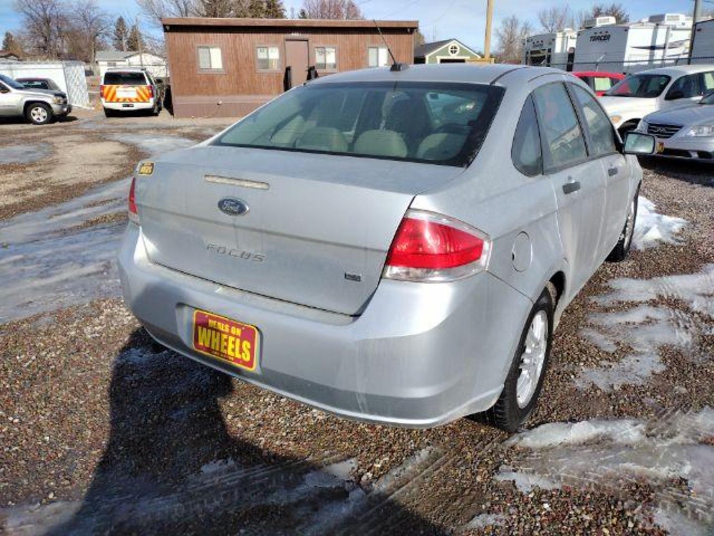 2010 Ford Focus SE Sedan (1FAHP3FN2AW) with an 2.0L L4 DOHC 16V engine, located at 4801 10th Ave S,, Great Falls, MT, 59405, 0.000000, 0.000000 - Photo#4