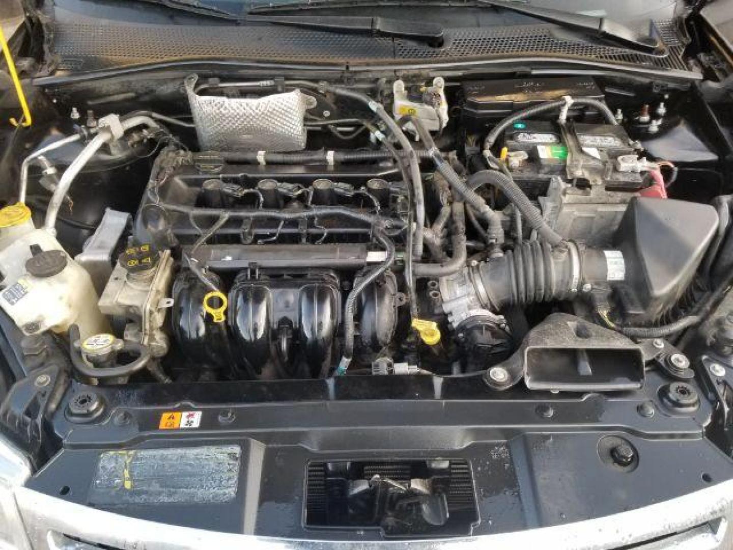 2010 Ford Focus SE Sedan (1FAHP3FN5AW) with an 2.0L L4 DOHC 16V engine, located at 601 E. Idaho St., Kalispell, MT, 59901, 0.000000, 0.000000 - Photo#13