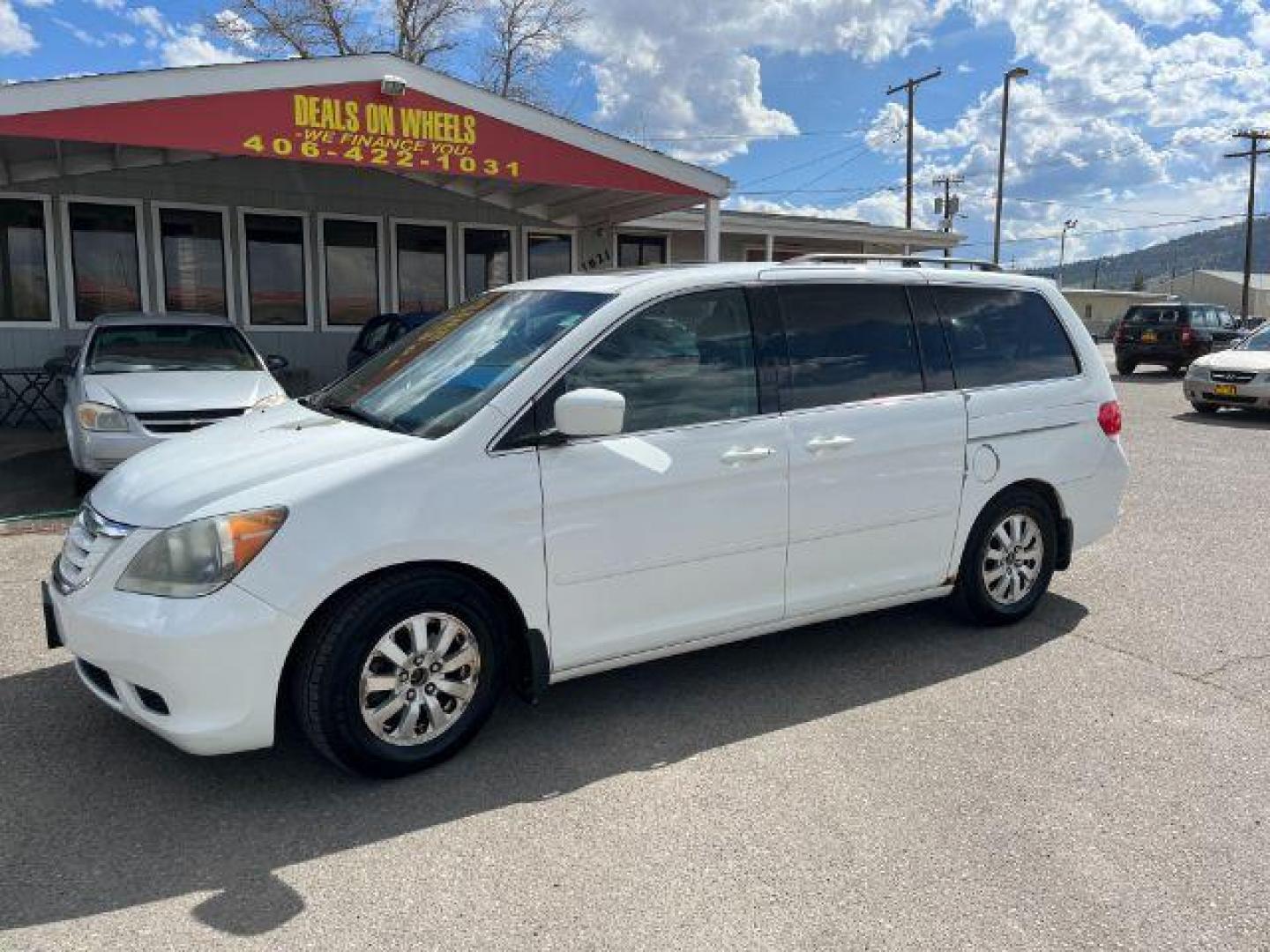 2010 Honda Odyssey EX-L w/ DVD and Navi (5FNRL3H74AB) with an 3.5L V6 SOHC 24V engine, 5-Speed Automatic transmission, located at 1821 N Montana Ave., Helena, MT, 59601, (406) 422-1031, 0.000000, 0.000000 - Photo#0