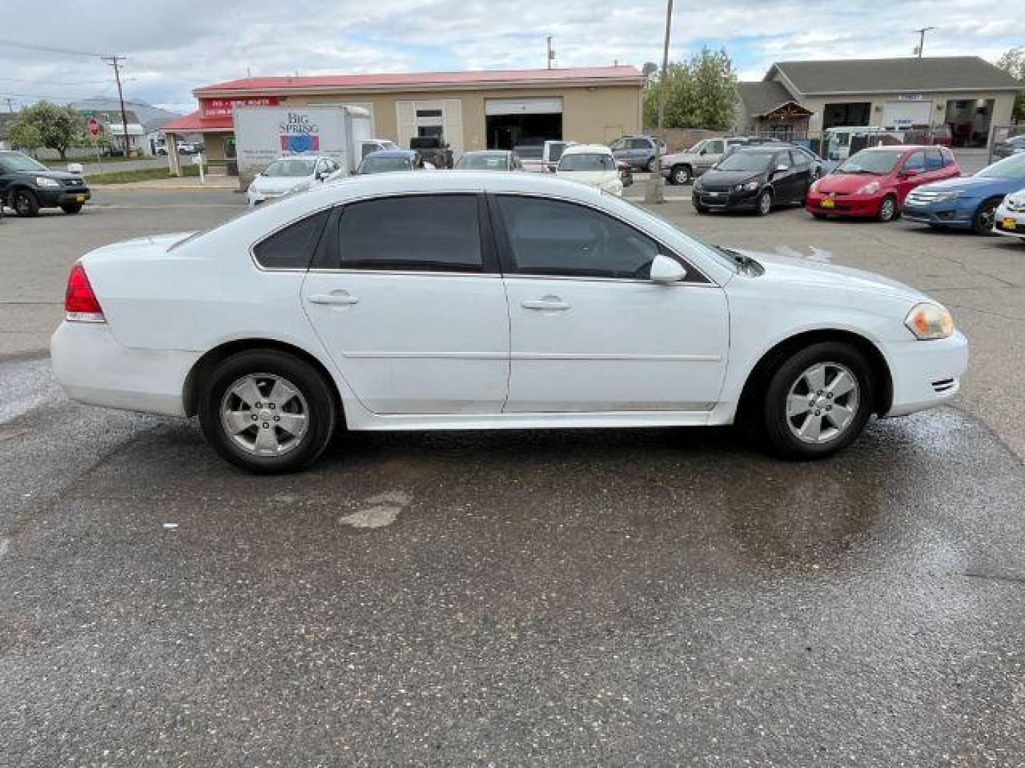 2011 Summit White Chevrolet Impala LS (2G1WF5EK9B1) with an 3.5L V6 OHV 16V FFV engine, 4-Speed Automatic transmission, located at 1821 N Montana Ave., Helena, MT, 59601, (406) 422-1031, 0.000000, 0.000000 - Photo#3