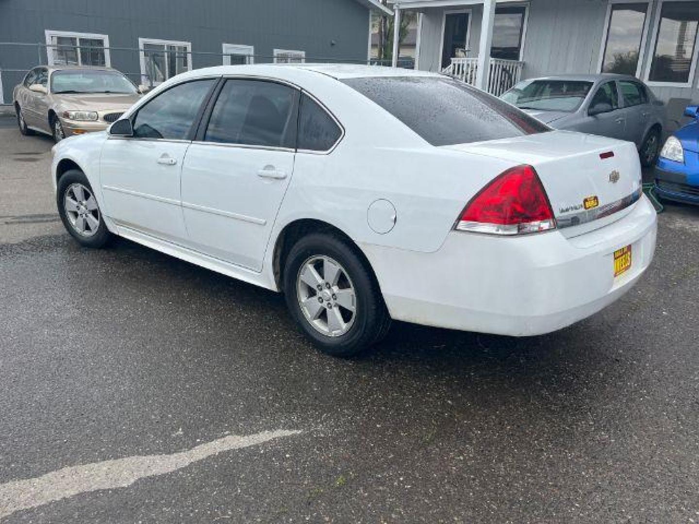 2011 Summit White Chevrolet Impala LS (2G1WF5EK9B1) with an 3.5L V6 OHV 16V FFV engine, 4-Speed Automatic transmission, located at 1821 N Montana Ave., Helena, MT, 59601, (406) 422-1031, 0.000000, 0.000000 - Photo#5