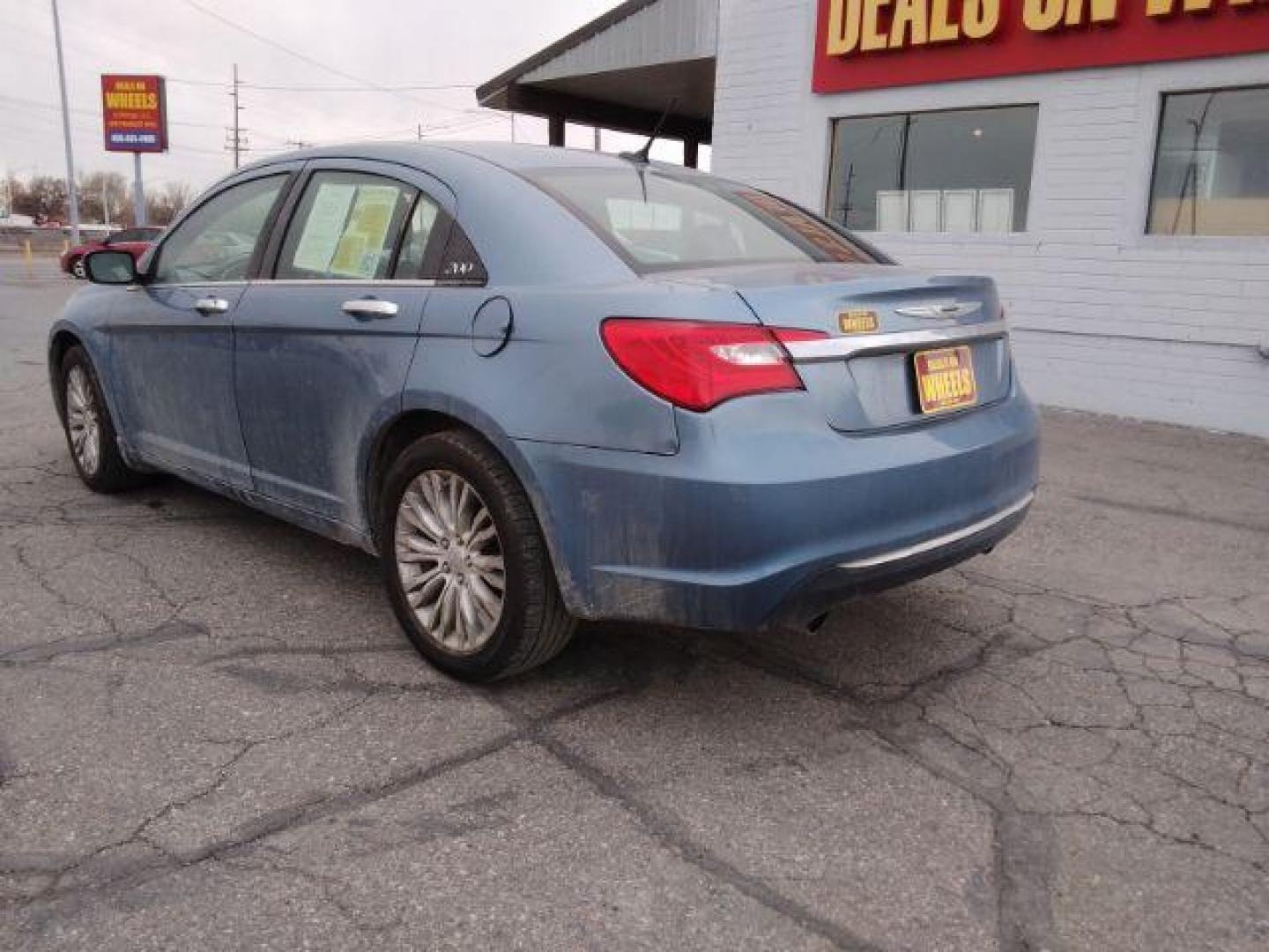 2011 Chrysler 200 Limited (1C3BC2FG4BN) with an 3.6L V6 DOHC 24V FFV engine, 6-Speed Automatic transmission, located at 4047 Montana Ave., Billings, MT, 59101, 45.770847, -108.529800 - Photo#6