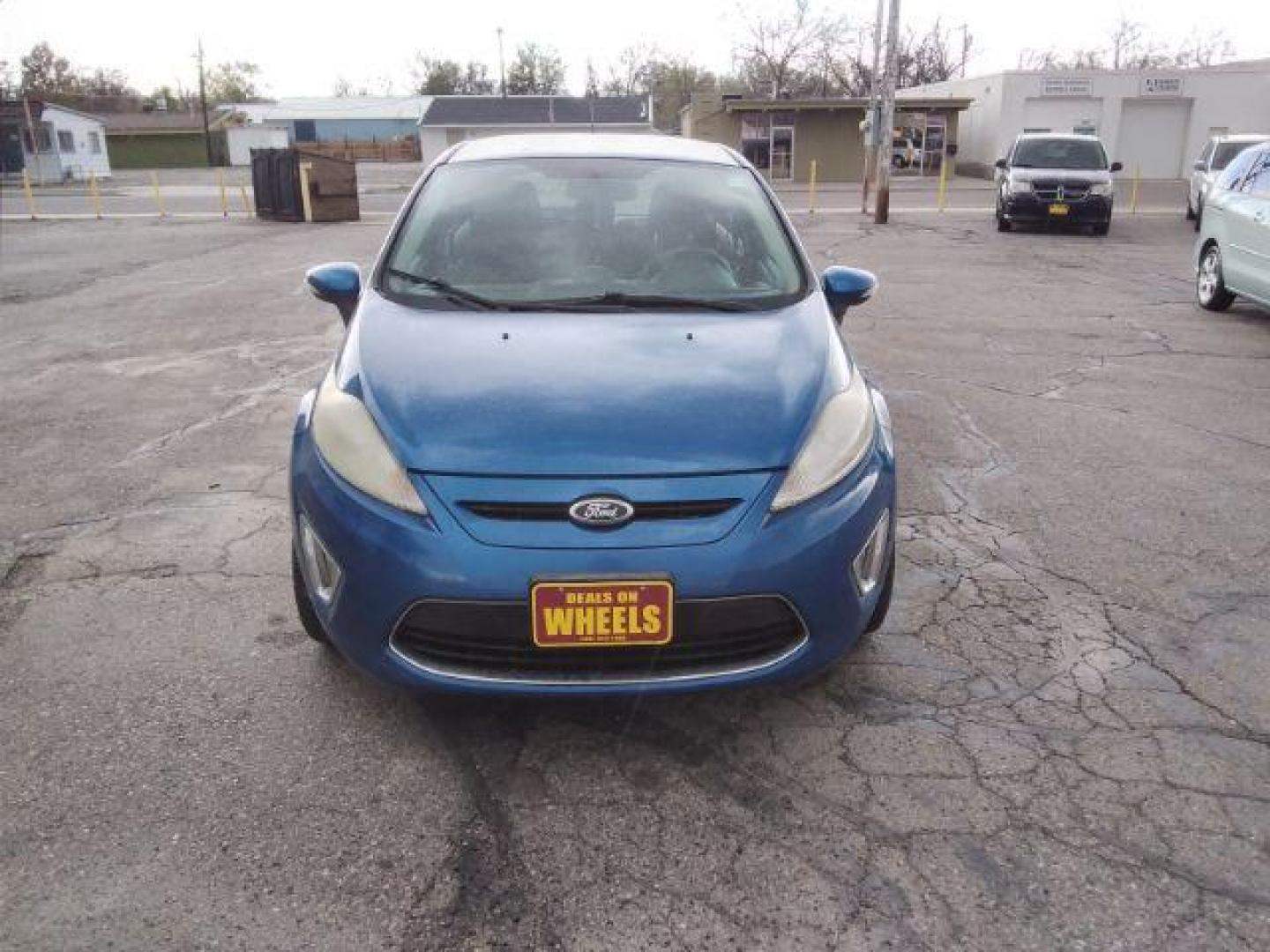 2011 Ford Fiesta SES Hatchback (3FADP4FJ6BM) with an 1.6L L4 DOHC 16V engine, located at 4047 Montana Ave., Billings, MT, 59101, 45.770847, -108.529800 - Photo#2