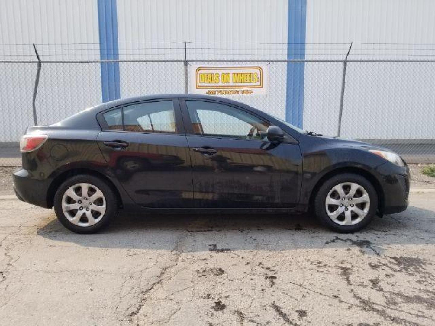 2011 Black Mica Mazda MAZDA3 i Sport 4-Door (JM1BL1UG6B1) with an 2.0L L4 DOHC 16V engine, located at 4801 10th Ave S,, Great Falls, MT, 59405, 0.000000, 0.000000 - Photo#5