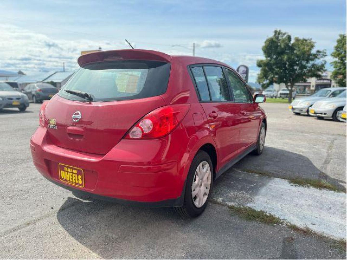 2011 Nissan Versa 1.8 SL Hatchback (3N1BC1CP0BL) with an 1.8L L4 DOHC 16V engine, Continuously Variable Transmission transmission, located at 601 E. Idaho St., Kalispell, MT, 59901, 0.000000, 0.000000 - Photo#3