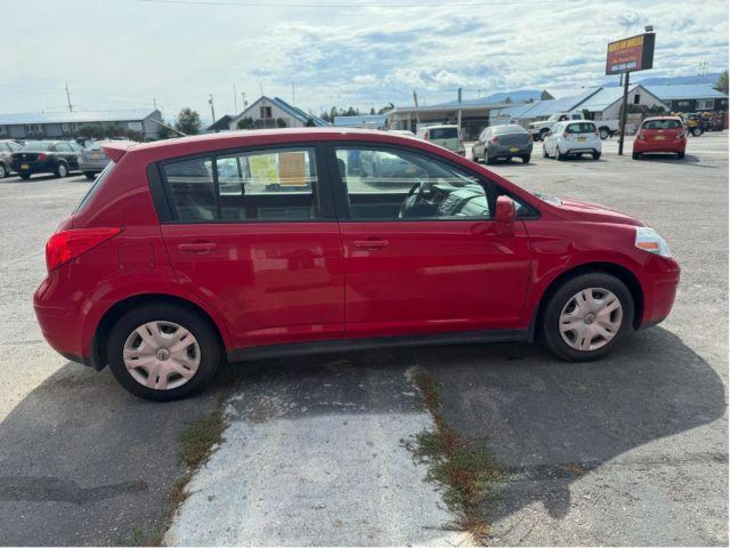 2011 Nissan Versa 1.8 SL Hatchback (3N1BC1CP0BL) with an 1.8L L4 DOHC 16V engine, Continuously Variable Transmission transmission, located at 601 E. Idaho St., Kalispell, MT, 59901, 0.000000, 0.000000 - Photo#4