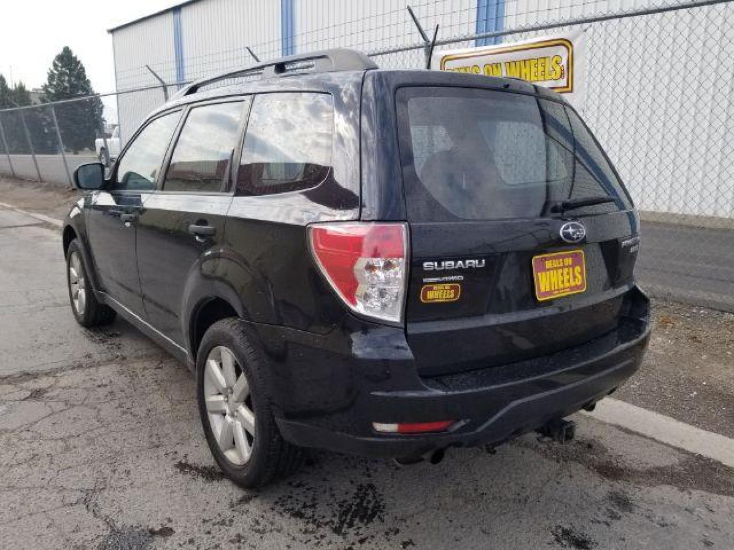 2011 Subaru Forester 2.5X Touring (JF2SHABC4BH) with an 2.5L H4 SOHC 16V engine, 4-Speed Automatic transmission, located at 4047 Montana Ave., Billings, MT, 59101, 45.770847, -108.529800 - Photo#3