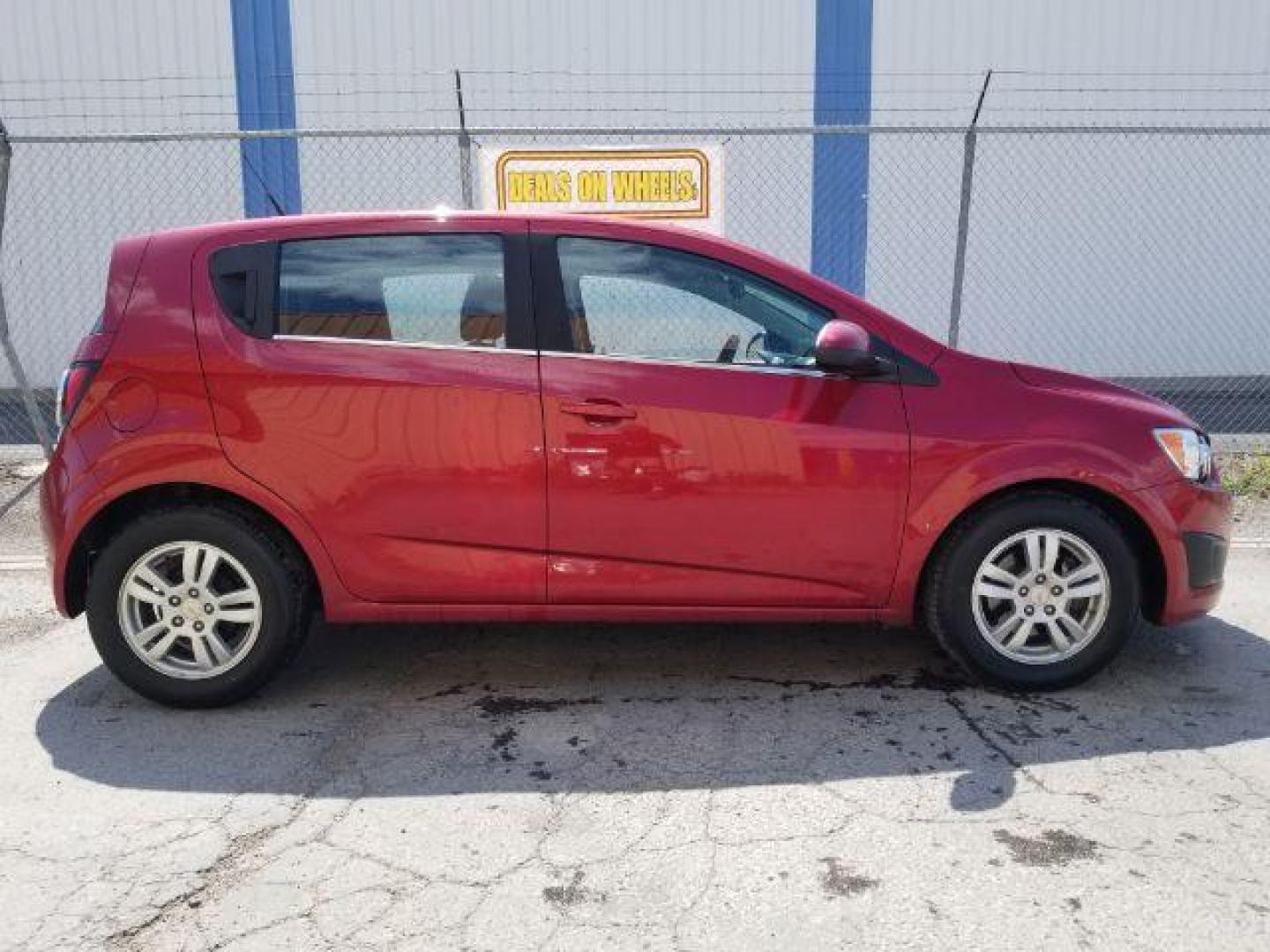 2012 Chevrolet Sonic 2LT 5-Door (1G1JC6SH6C4) with an 1.8L L4 DOHC 24V engine, 6-Speed Automatic transmission, located at 4801 10th Ave S,, Great Falls, MT, 59405, 0.000000, 0.000000 - Photo#5