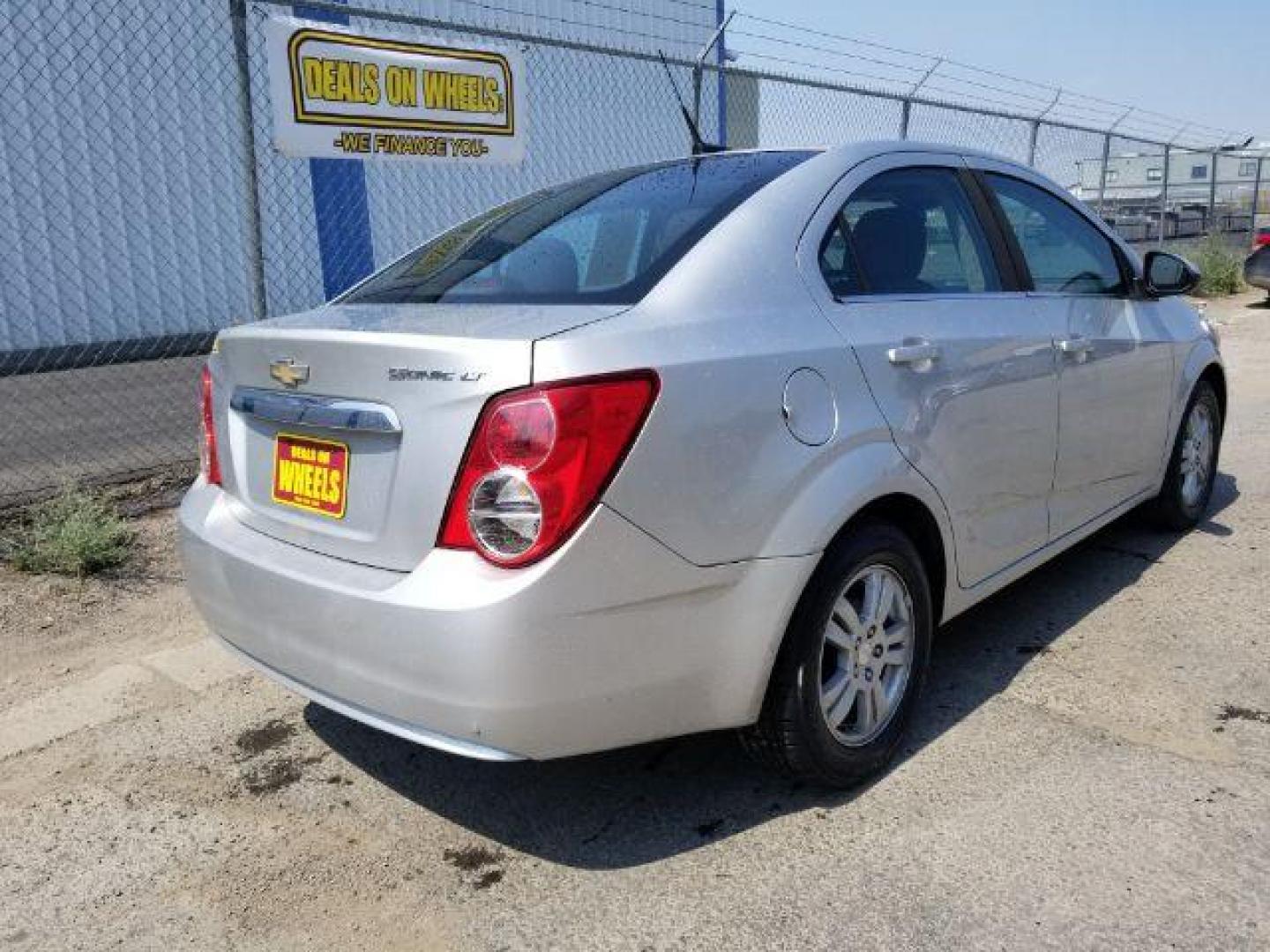 2012 Chevrolet Sonic 2LT Sedan (1G1JC5SH6C4) with an 1.8L L4 DOHC 24V engine, 6-Speed Automatic transmission, located at 601 E. Idaho St., Kalispell, MT, 59901, 0.000000, 0.000000 - Photo#4