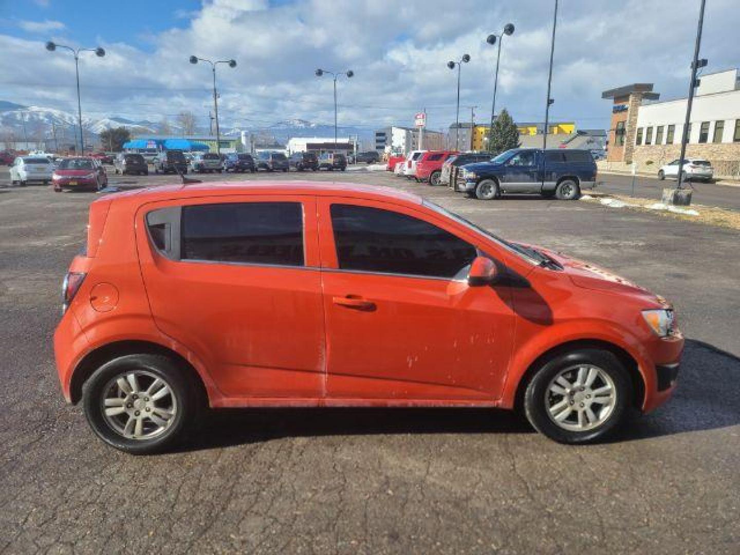 2012 Chevrolet Sonic 1LT 5-Door (1G1JD6SB2C4) with an 1.4L L4 DOHC 24V TUR engine, located at 1800 West Broadway, Missoula, 59808, (406) 543-1986, 46.881348, -114.023628 - Photo#2