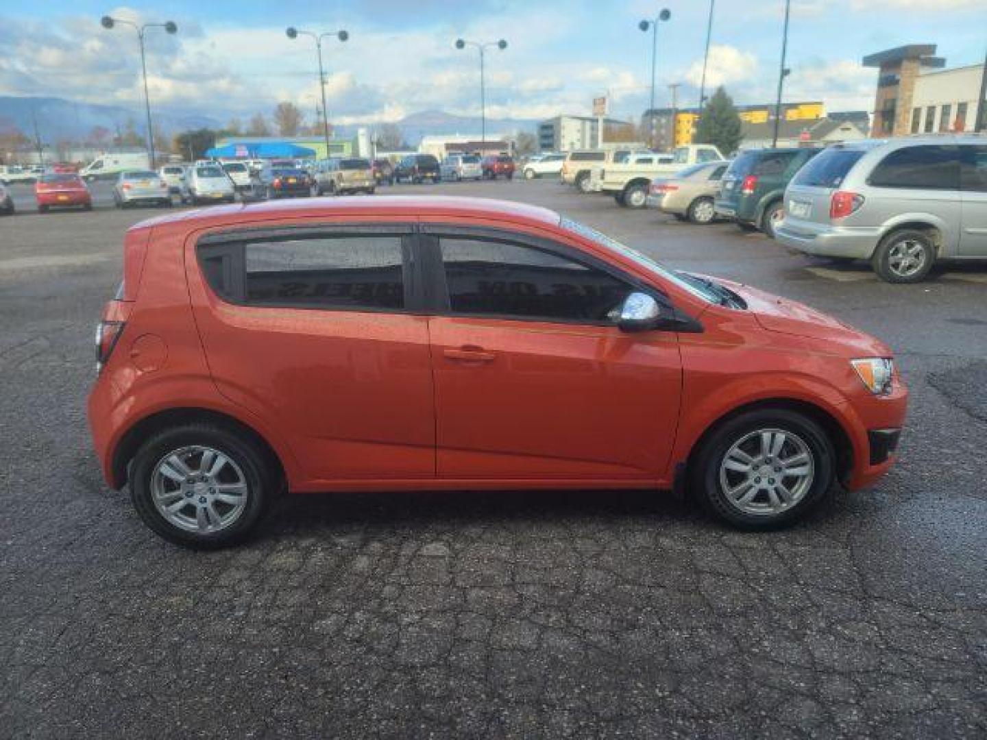 2012 Chevrolet Sonic 1LS 5-Door (1G1JB6SH8C4) with an 1.8L L4 DOHC 24V engine, 5-Speed Manual transmission, located at 1800 West Broadway, Missoula, 59808, (406) 543-1986, 46.881348, -114.023628 - Photo#2