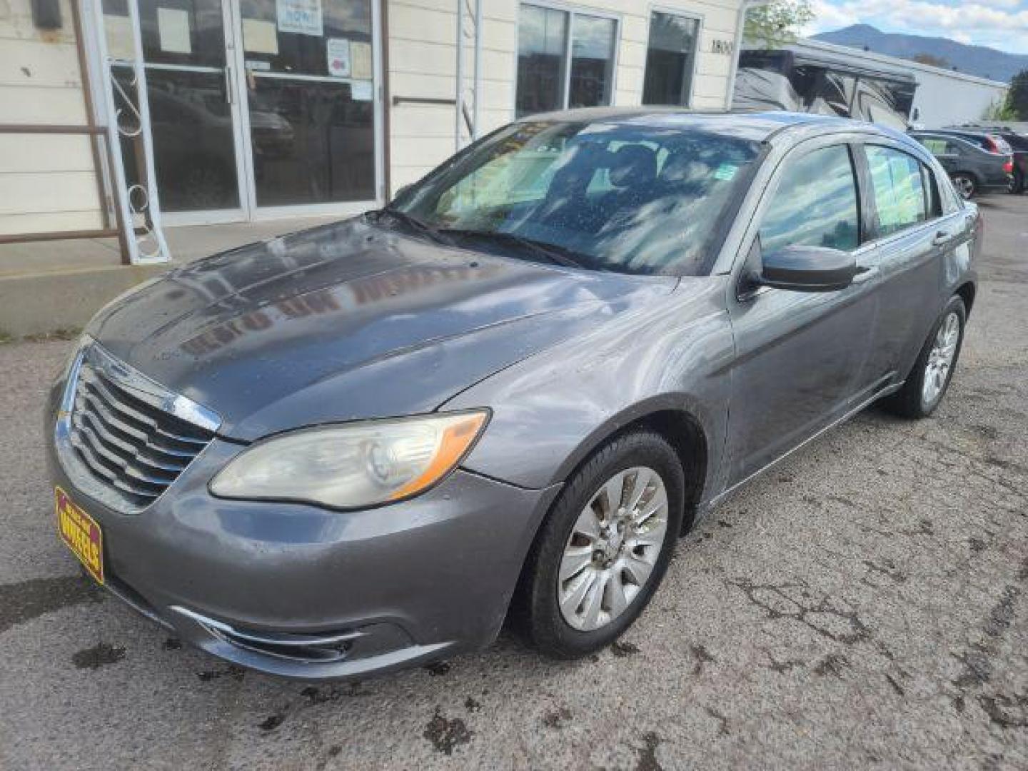 2012 Tungsten Metallic Chrysler 200 LX (1C3CCBAB1CN) with an 2.4L L4 DOHC 16V engine, 6-Speed Automatic transmission, located at 1800 West Broadway, Missoula, 59808, (406) 543-1986, 46.881348, -114.023628 - Photo#0