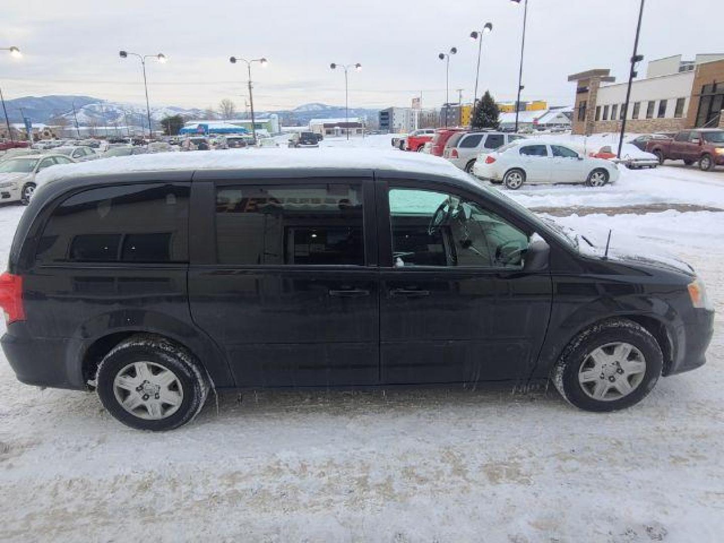 2012 Dodge Grand Caravan SE (2C4RDGBG0CR) with an 3.6L V6 DOHC 24V engine, 6-Speed Automatic transmission, located at 1800 West Broadway, Missoula, 59808, (406) 543-1986, 46.881348, -114.023628 - Photo#2