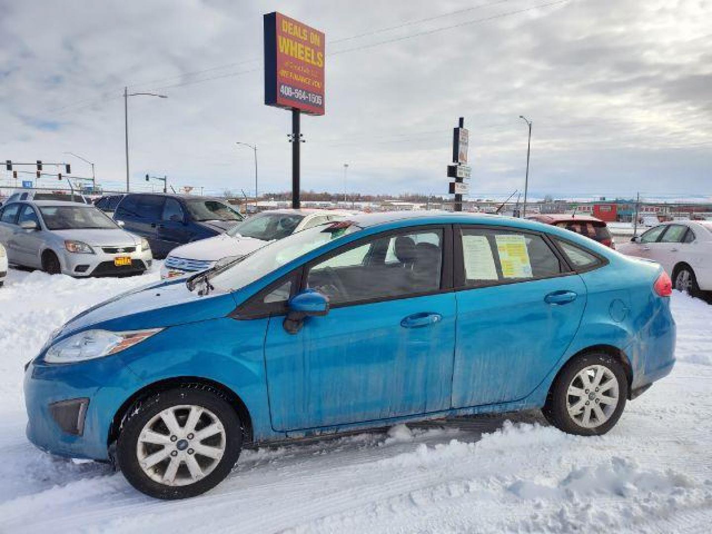 2012 Ford Fiesta SE Sedan (3FADP4BJ6CM) with an 1.6L L4 DOHC 16V engine, located at 4801 10th Ave S,, Great Falls, MT, 59405, 0.000000, 0.000000 - Photo#1