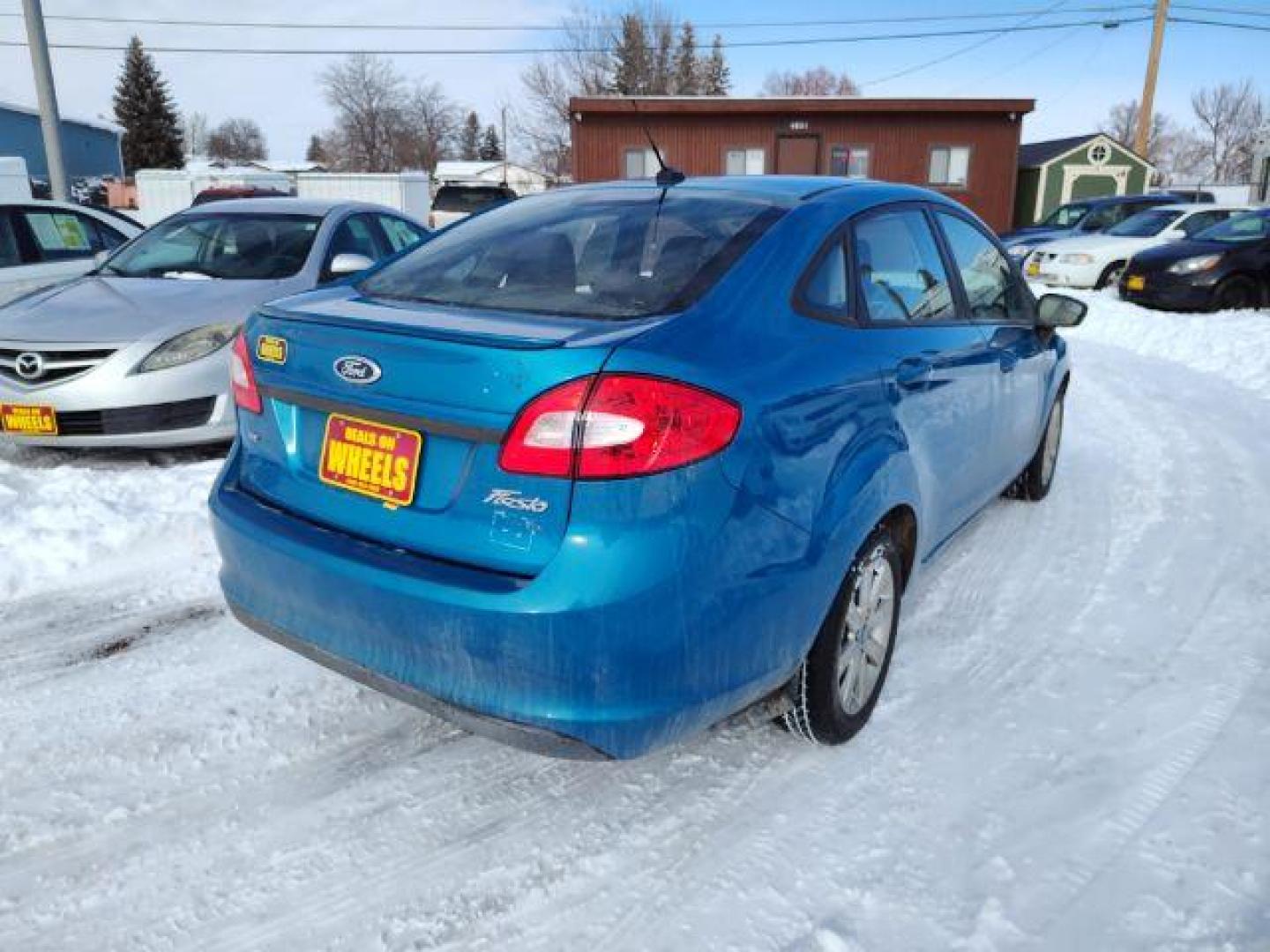 2012 Ford Fiesta SE Sedan (3FADP4BJ6CM) with an 1.6L L4 DOHC 16V engine, located at 4801 10th Ave S,, Great Falls, MT, 59405, 0.000000, 0.000000 - Photo#4