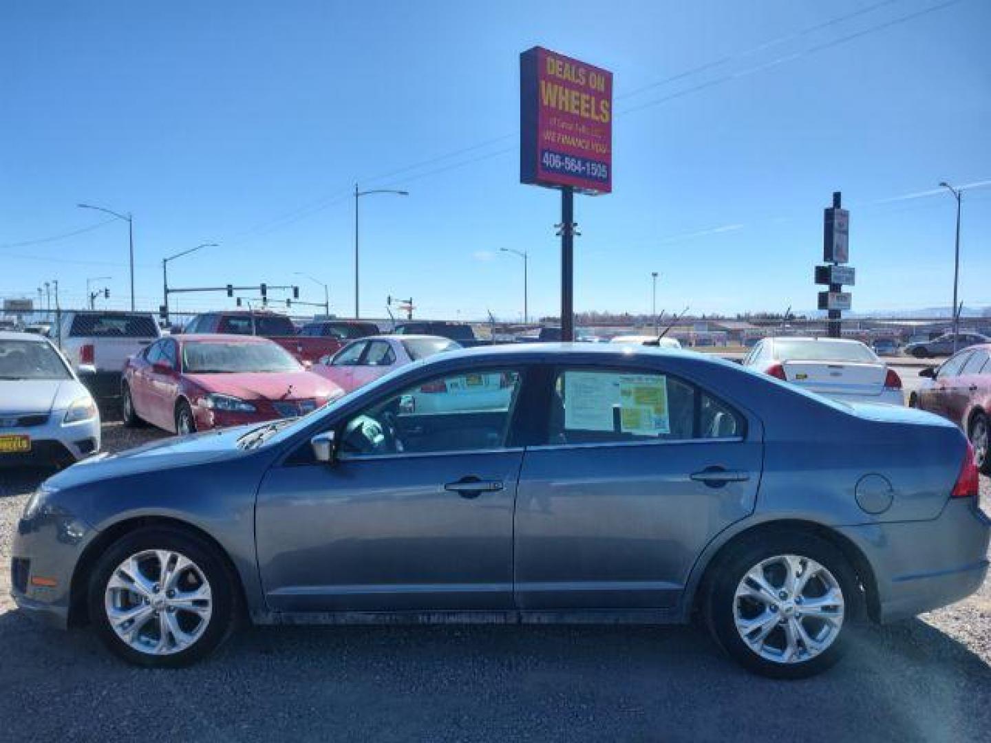 2012 Ford Fusion SE (3FAHP0HA0CR) with an 2.5L L4 DOHC 16V engine, located at 4801 10th Ave S,, Great Falls, MT, 59405, 0.000000, 0.000000 - Photo#1