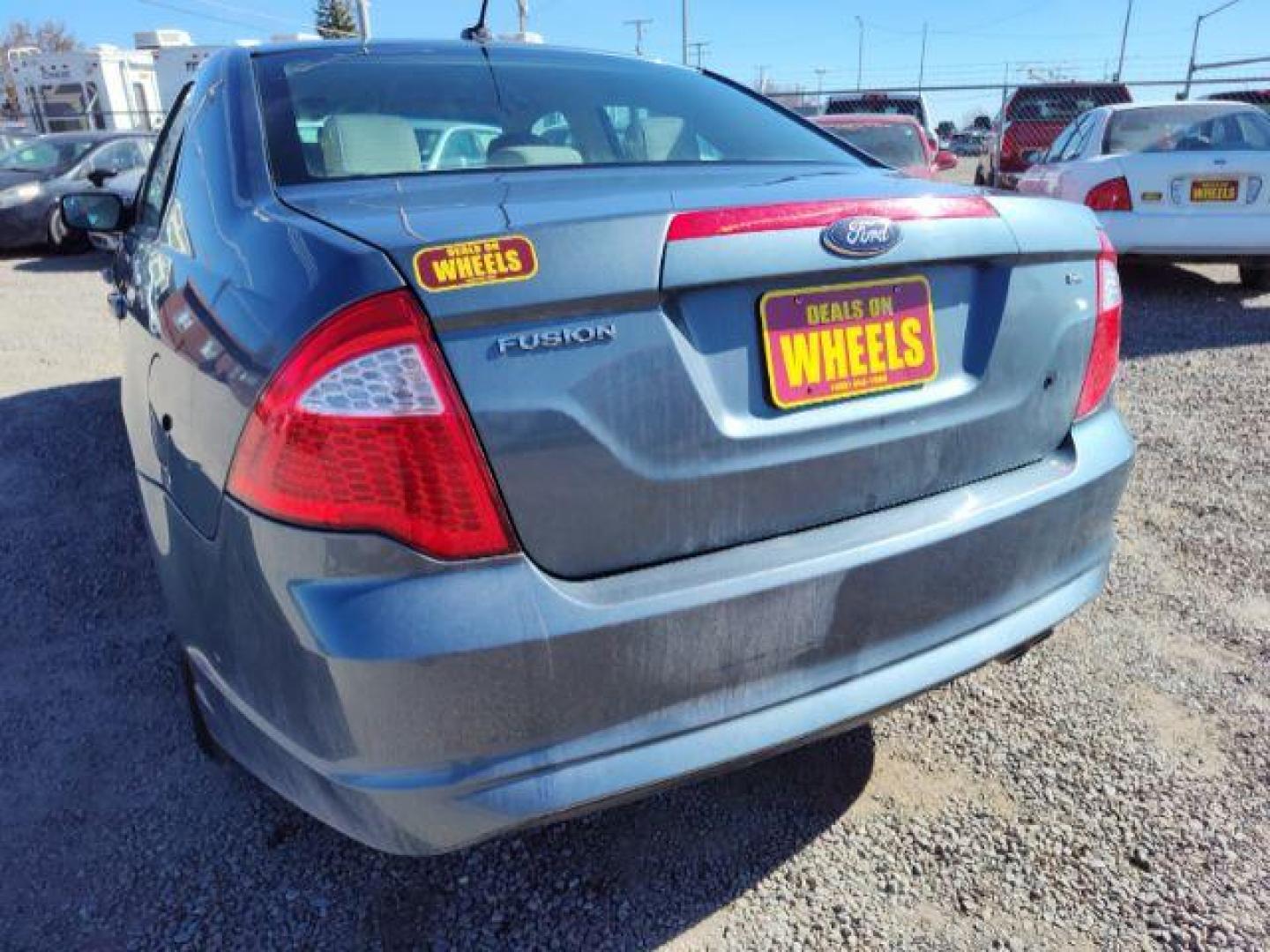 2012 Ford Fusion SE (3FAHP0HA0CR) with an 2.5L L4 DOHC 16V engine, located at 4801 10th Ave S,, Great Falls, MT, 59405, 0.000000, 0.000000 - Photo#2