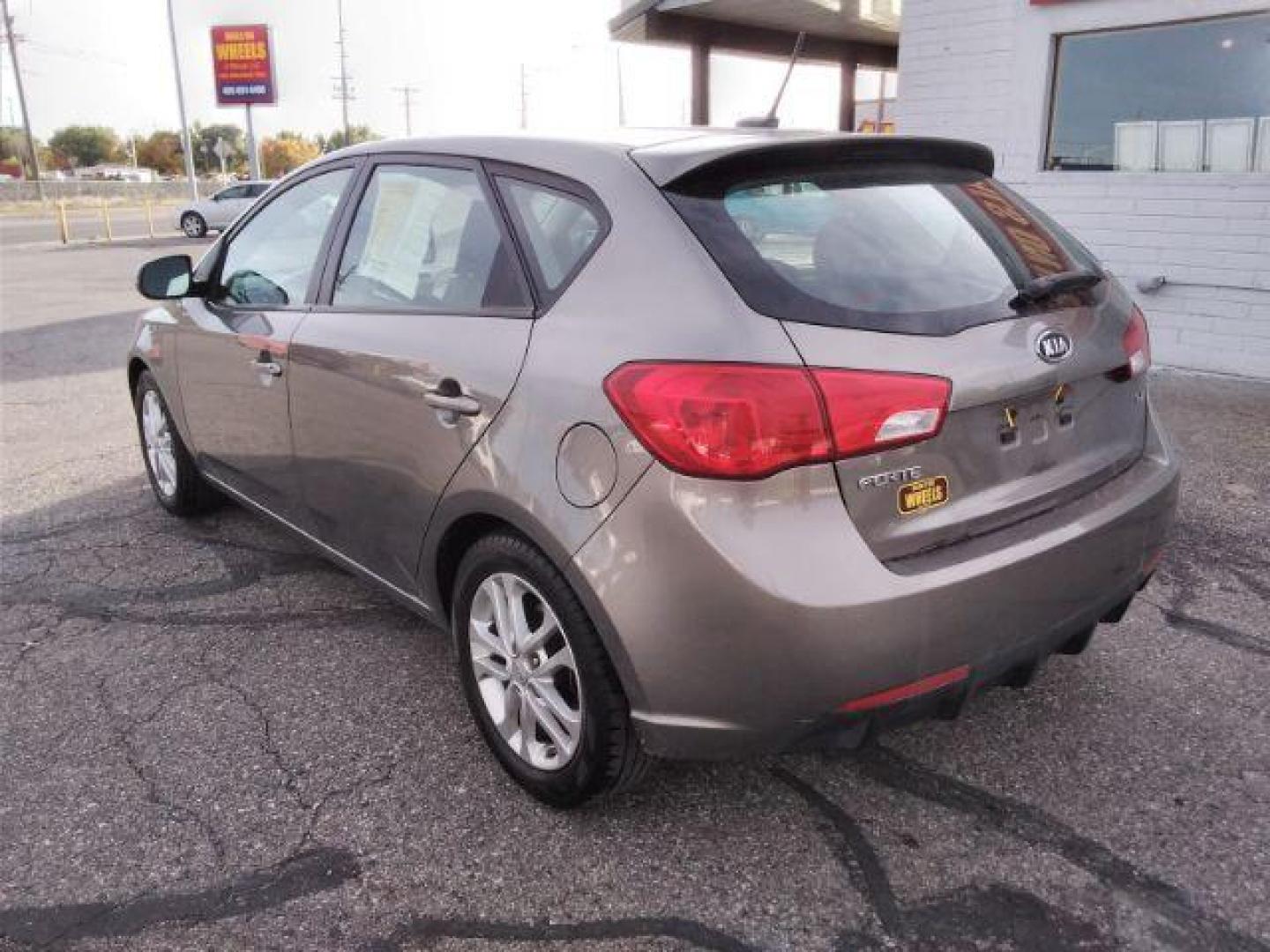 2012 Kia Forte 5-Door EX (KNAFU5A25C5) with an 2.0L L4 DOHC 16V engine, located at 4047 Montana Ave., Billings, MT, 59101, 45.770847, -108.529800 - Photo#6