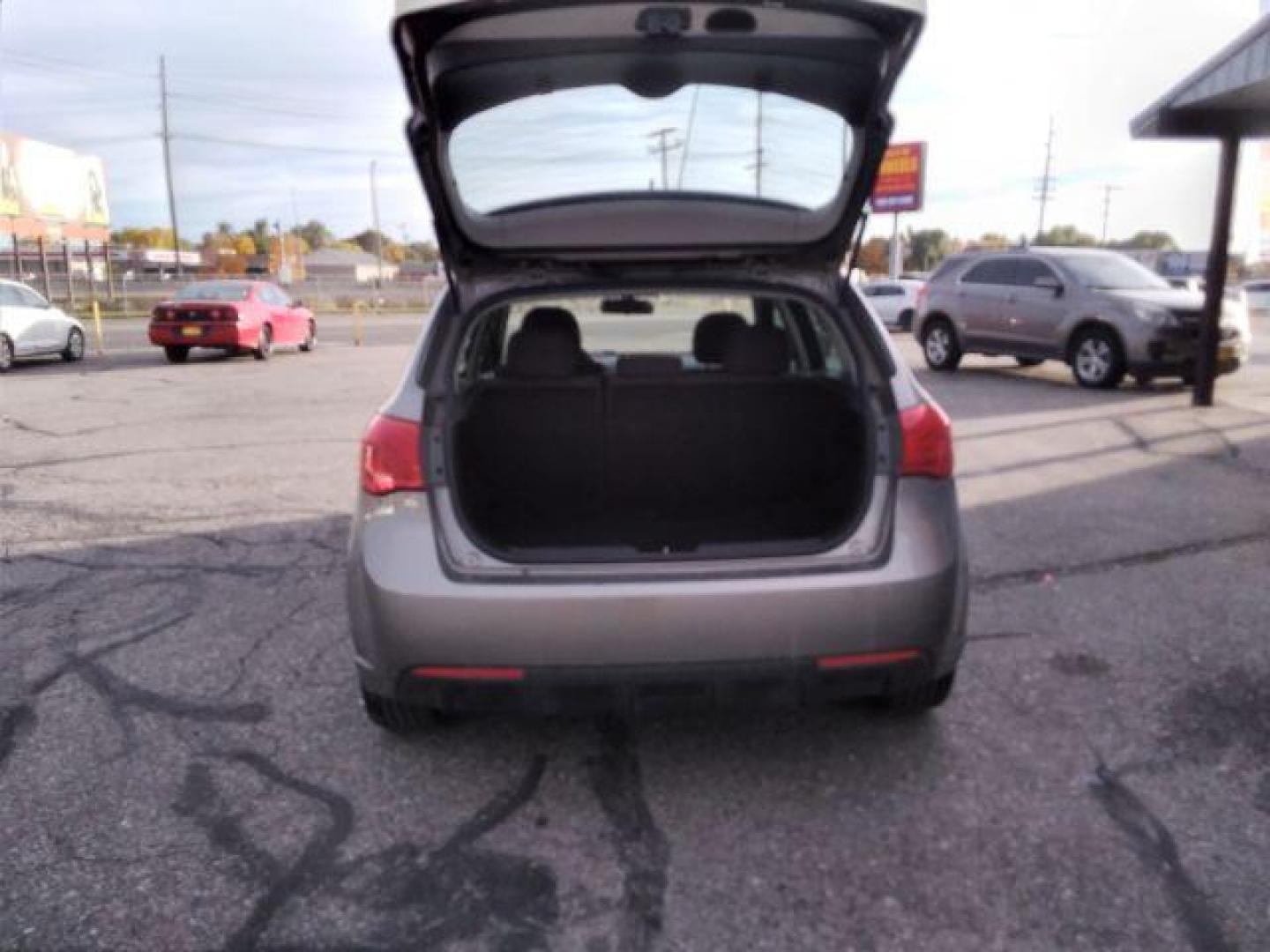 2012 Kia Forte 5-Door EX (KNAFU5A25C5) with an 2.0L L4 DOHC 16V engine, located at 4047 Montana Ave., Billings, MT, 59101, 45.770847, -108.529800 - Photo#7