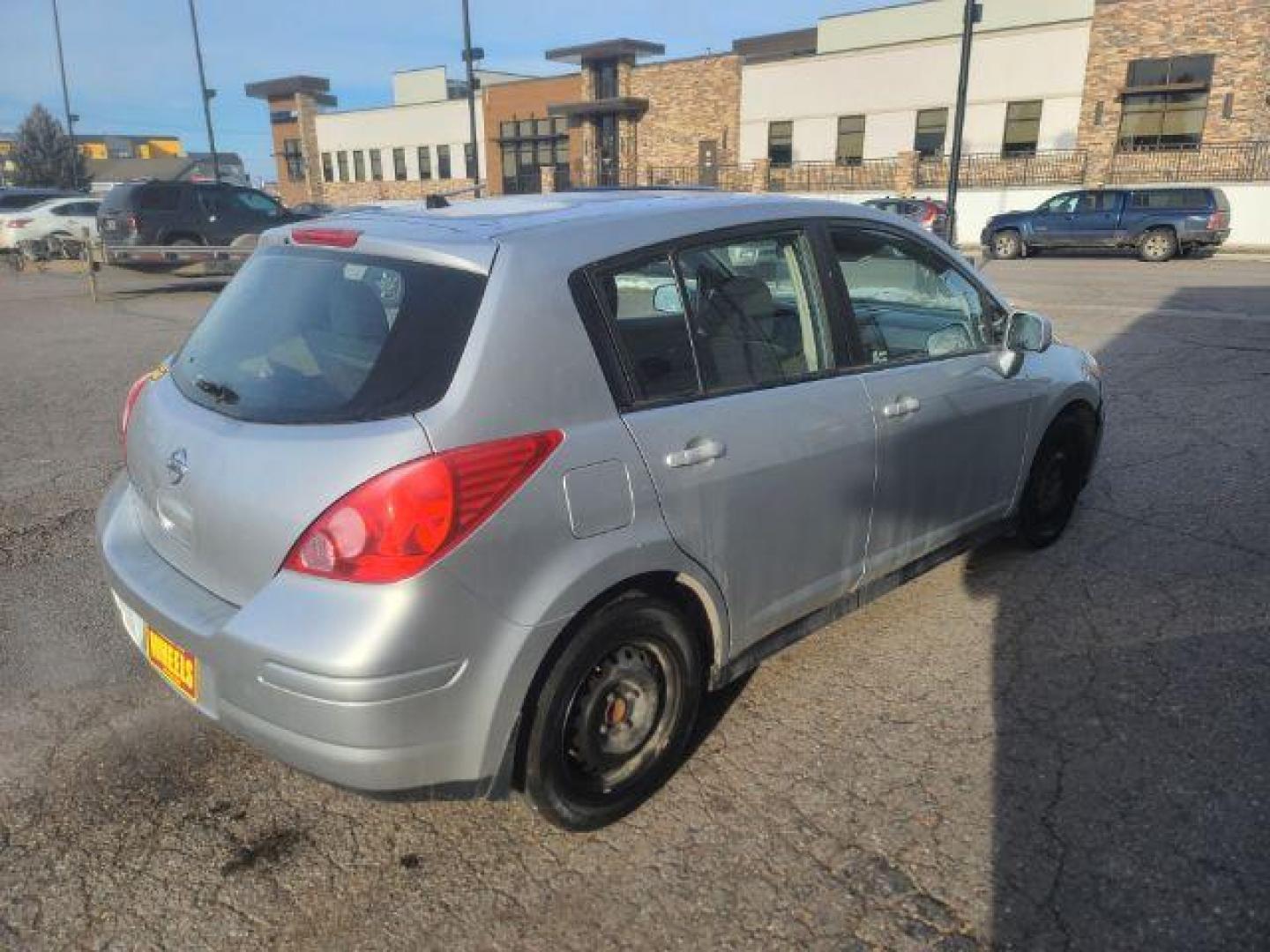 2012 Nissan Versa 1.8 SL Hatchback (3N1BC1CP8CL) with an 1.8L L4 DOHC 16V engine, Continuously Variable Transmission transmission, located at 1800 West Broadway, Missoula, 59808, (406) 543-1986, 46.881348, -114.023628 - Photo#3