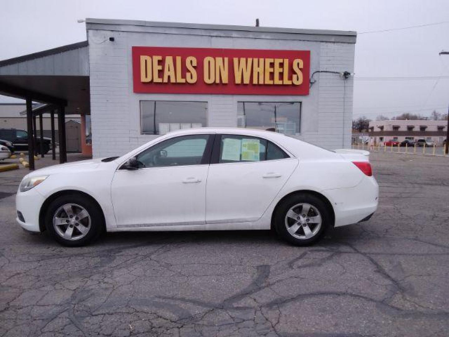 2013 Summit White Chevrolet Malibu LS (1G11B5SAXDF) with an 2.5L L4 DOHC 16V engine, 6-Speed Automatic transmission, located at 4047 Montana Ave., Billings, MT, 59101, 45.770847, -108.529800 - Photo#0