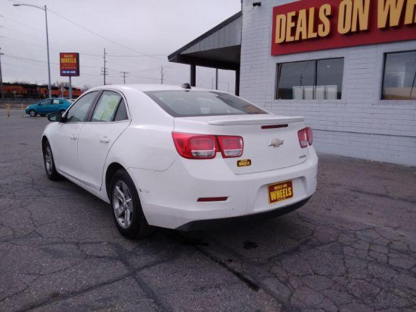 2013 Summit White Chevrolet Malibu LS (1G11B5SAXDF) with an 2.5L L4 DOHC 16V engine, 6-Speed Automatic transmission, located at 4047 Montana Ave., Billings, MT, 59101, 45.770847, -108.529800 - Photo#7