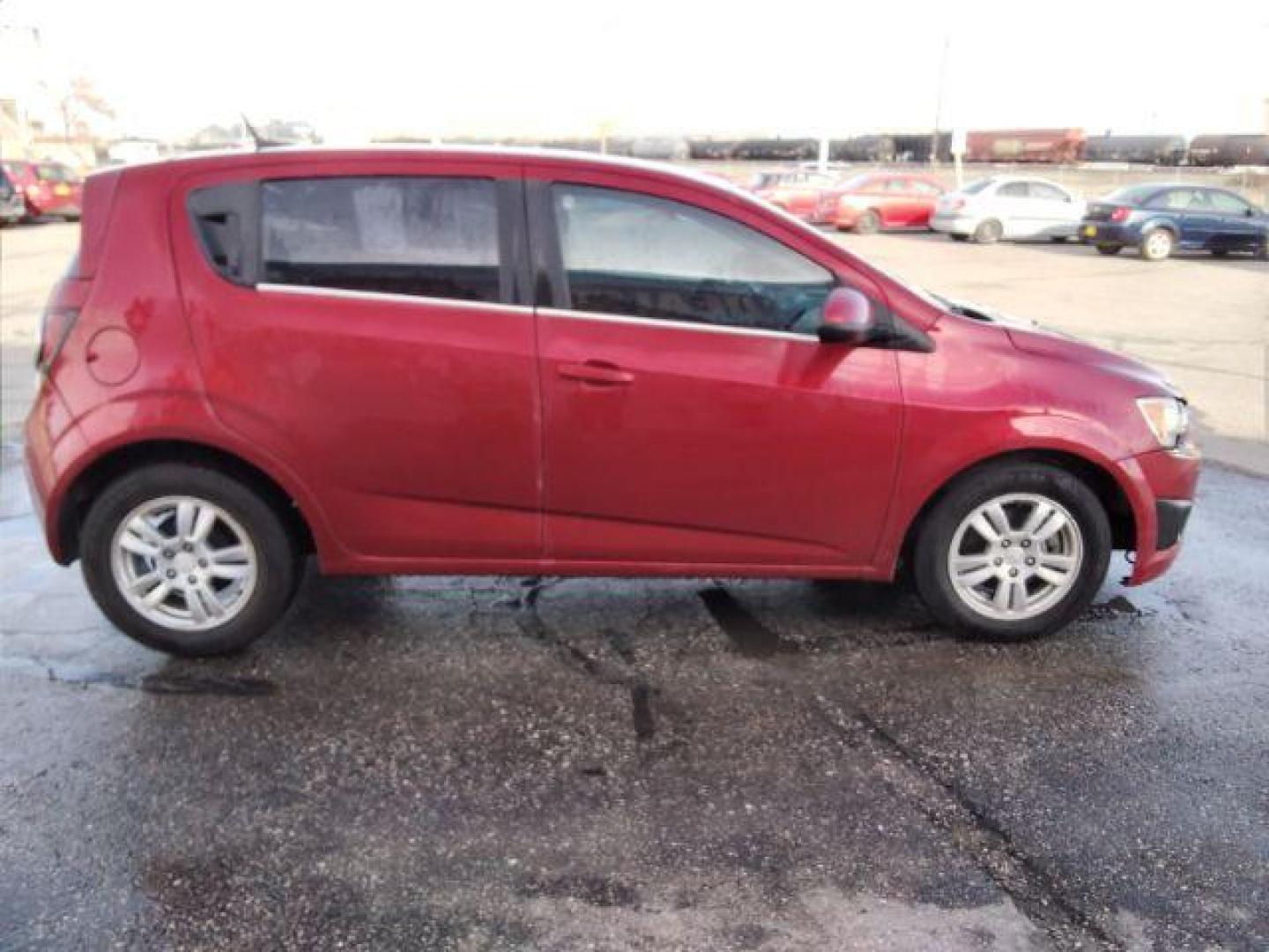 2013 Chevrolet Sonic LT Auto 5-Door (1G1JC6SB3D4) with an 1.4L L4 DOHC 24V TURBO engine, 6-Speed Automatic transmission, located at 4047 Montana Ave., Billings, MT, 59101, 45.770847, -108.529800 - Photo#3