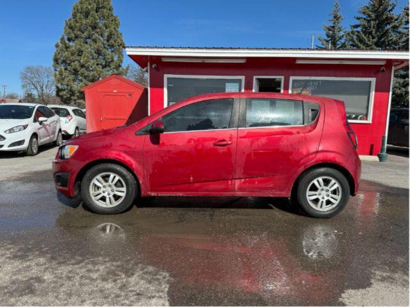 2013 Chevrolet Sonic LT Auto 5-Door (1G1JC6SB7D4) with an 1.4L L4 DOHC 24V TURBO engine, 6-Speed Automatic transmission, located at 601 E. Idaho St., Kalispell, MT, 59901, 0.000000, 0.000000 - Photo#1