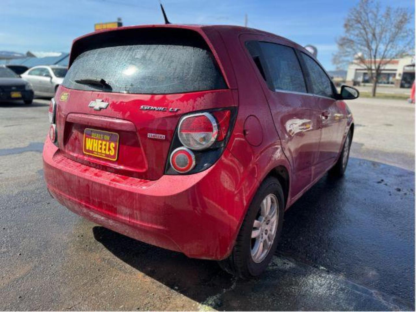 2013 Chevrolet Sonic LT Auto 5-Door (1G1JC6SB7D4) with an 1.4L L4 DOHC 24V TURBO engine, 6-Speed Automatic transmission, located at 601 E. Idaho St., Kalispell, MT, 59901, 0.000000, 0.000000 - Photo#2