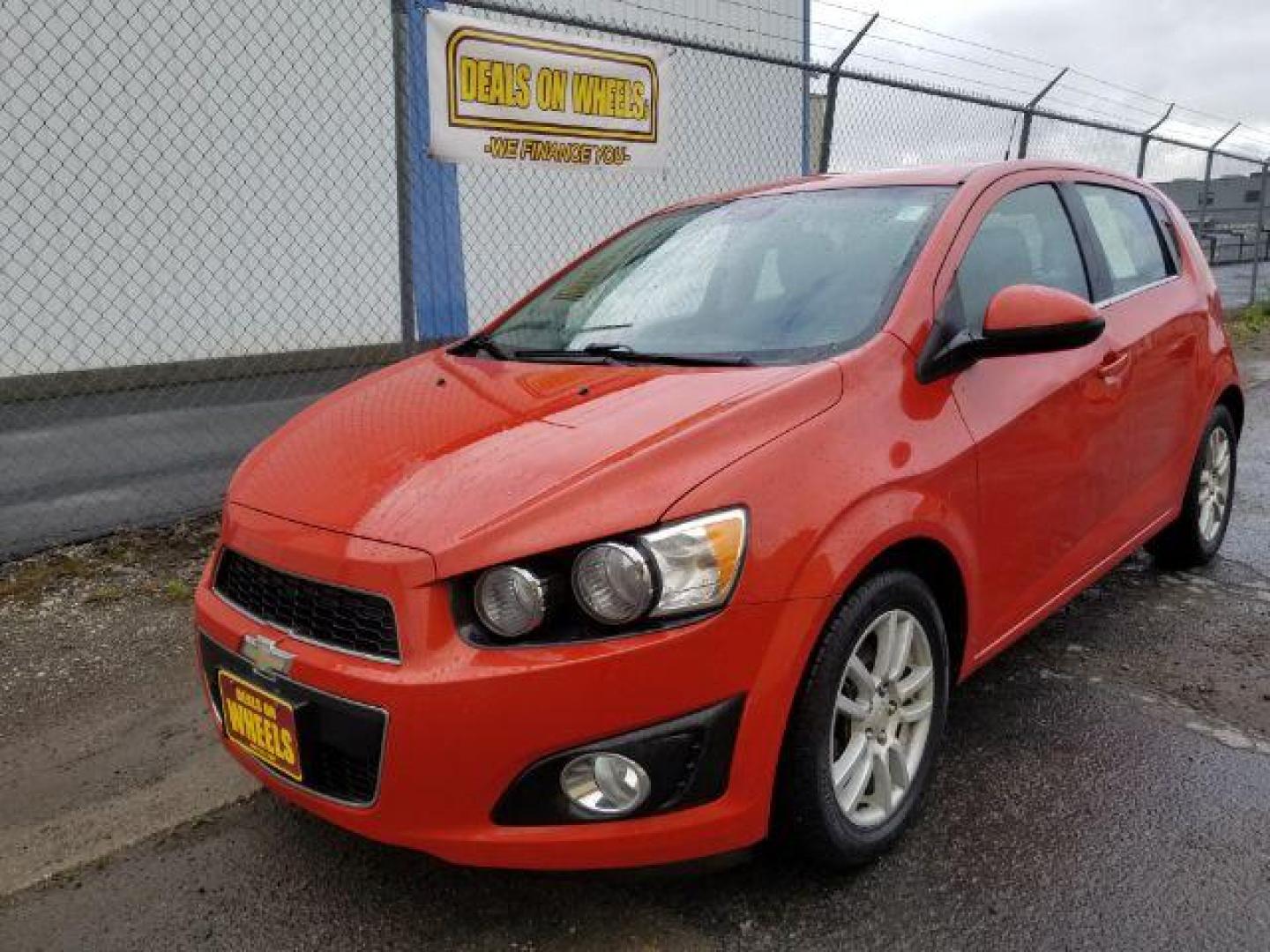 2013 Chevrolet Sonic LT Auto 5-Door (1G1JC6SH9D4) with an 1.8L L4 DOHC 24V engine, 6-Speed Automatic transmission, located at 601 E. Idaho St., Kalispell, MT, 59901, 0.000000, 0.000000 - Photo#0