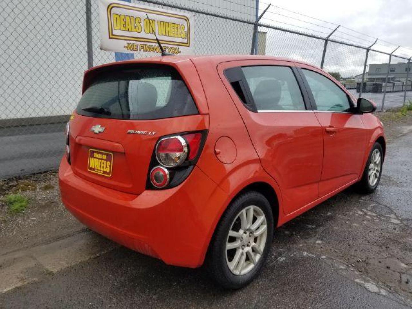 2013 Chevrolet Sonic LT Auto 5-Door (1G1JC6SH9D4) with an 1.8L L4 DOHC 24V engine, 6-Speed Automatic transmission, located at 601 E. Idaho St., Kalispell, MT, 59901, 0.000000, 0.000000 - Photo#4