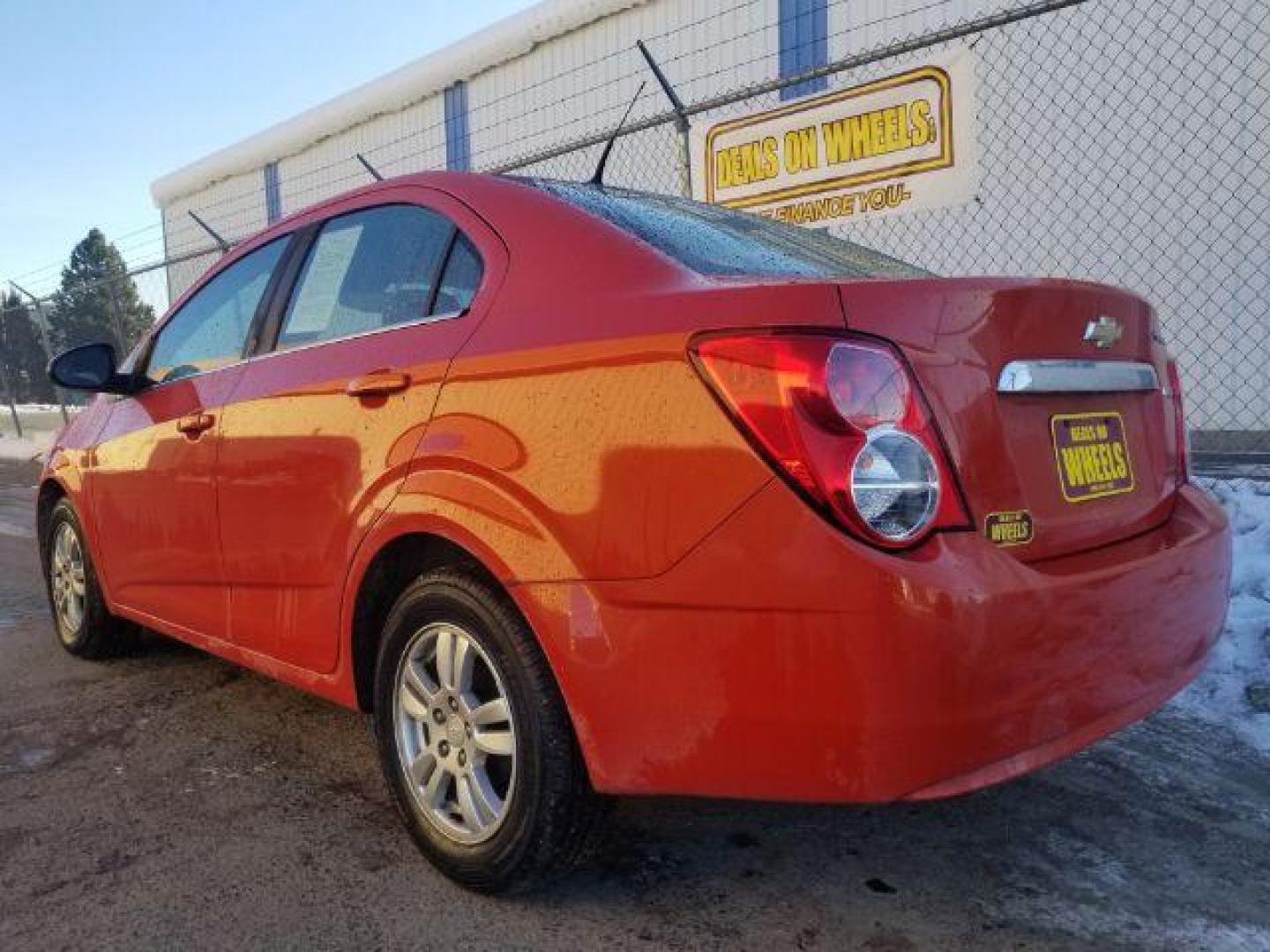 2013 Chevrolet Sonic LT Manual Sedan (1G1JD5SB1D4) with an 1.4L L4 DOHC 24V TURBO engine, 5-Speed Manual transmission, located at 1800 West Broadway, Missoula, 59808, (406) 543-1986, 46.881348, -114.023628 - Photo#5