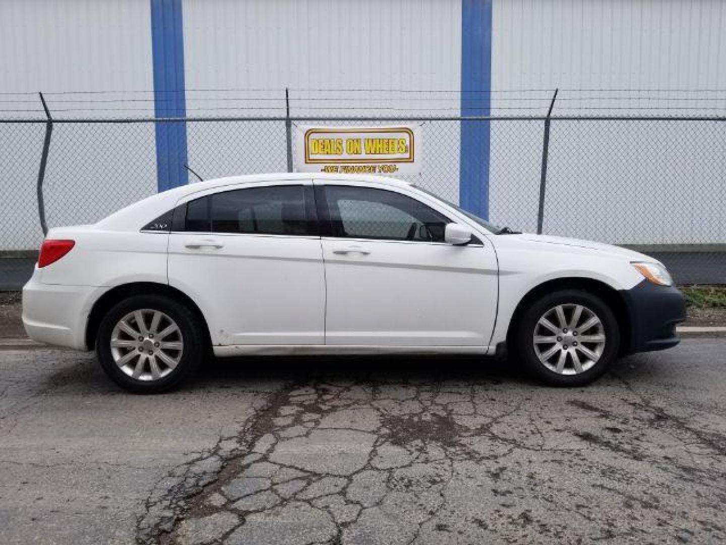 2013 Bright White Chrysler 200 Touring (1C3CCBBB4DN) with an 2.4L L4 DOHC 16V engine, 6-Speed Automatic transmission, located at 4801 10th Ave S,, Great Falls, MT, 59405, 0.000000, 0.000000 - Photo#5