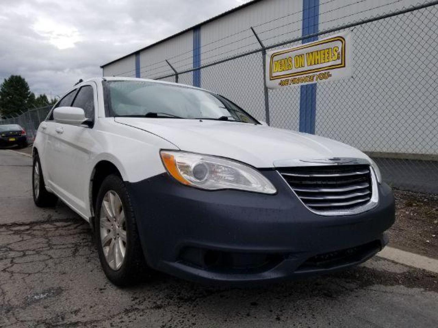 2013 Bright White Chrysler 200 Touring (1C3CCBBB4DN) with an 2.4L L4 DOHC 16V engine, 6-Speed Automatic transmission, located at 4801 10th Ave S,, Great Falls, MT, 59405, 0.000000, 0.000000 - Photo#6