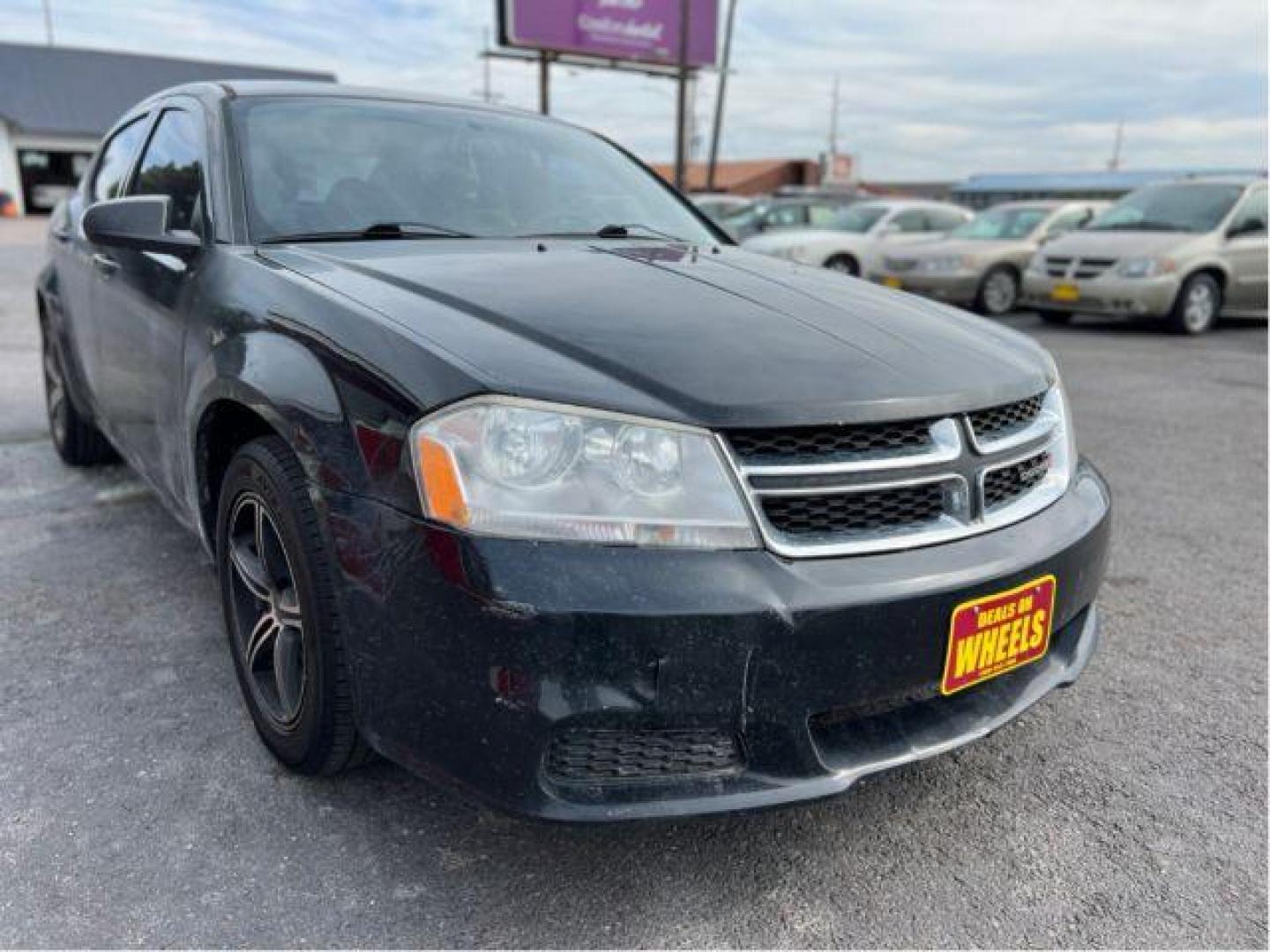 2013 Dodge Avenger Base (1C3CDZAB3DN) with an 2.4L L4 DOHC 16V engine, 4-Speed Automatic transmission, located at 4047 Montana Ave., Billings, MT, 59101, 45.770847, -108.529800 - Photo#6