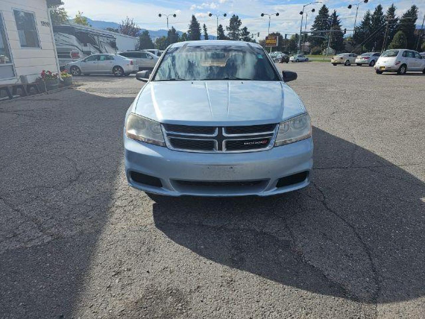 2013 Dodge Avenger Base (1C3CDZAB0DN) with an 2.4L L4 DOHC 16V engine, 4-Speed Automatic transmission, located at 4047 Montana Ave., Billings, MT, 59101, 45.770847, -108.529800 - Photo#1