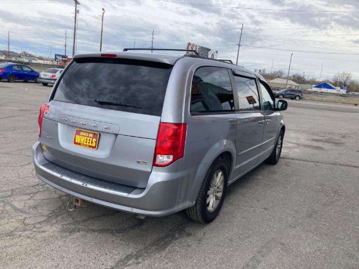 2013 Dodge Grand Caravan SXT (2C4RDGCG8DR) with an 3.6L V6 DOHC 24V engine, 6-Speed Automatic transmission, located at 4047 Montana Ave., Billings, MT, 59101, 45.770847, -108.529800 - Photo#3