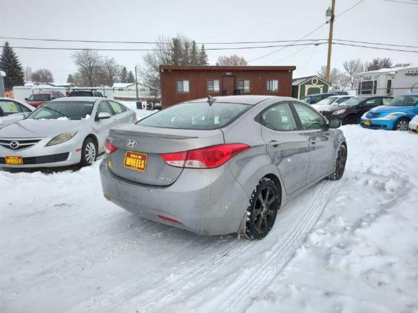 2013 Hyundai Elantra GLS A/T (KMHDH4AEXDU) with an 1.8L L4 DOHC 16V engine, 6-Speed Automatic transmission, located at 4801 10th Ave S,, Great Falls, MT, 59405, 0.000000, 0.000000 - Photo#4