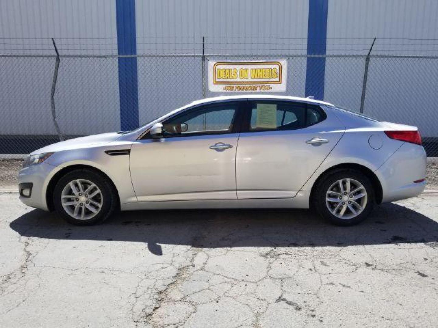 2013 Kia Optima LX AT (5XXGM4A71DG) with an 2.4L L4 DOHC 16V engine, 6-Speed Automatic transmission, located at 4047 Montana Ave., Billings, MT, 59101, 45.770847, -108.529800 - Photo#2