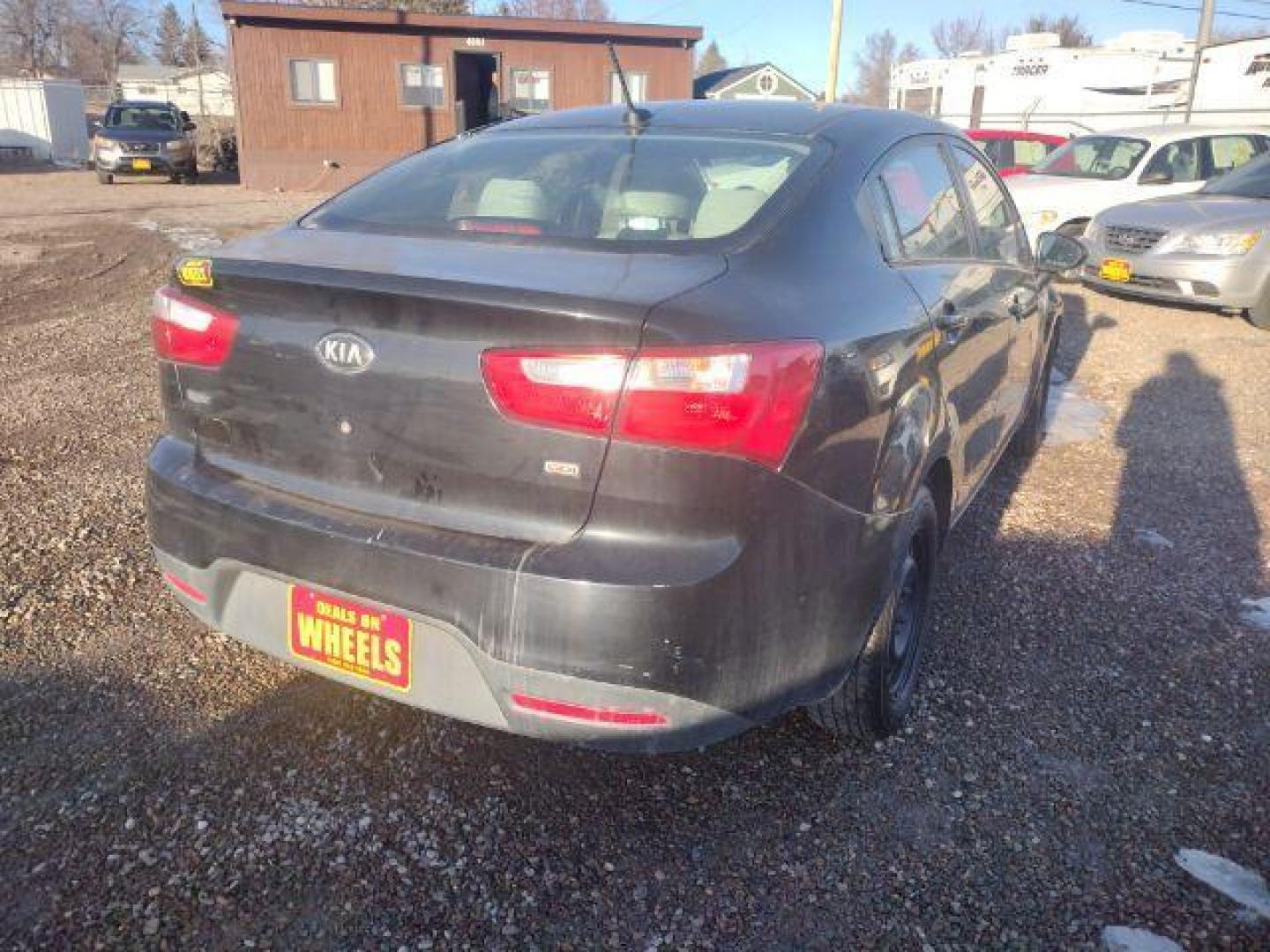 2013 Aurora Black Pearl Kia Rio LX (KNADM4A33D6) with an 1.6L L4 DOHC 16V engine, located at 4801 10th Ave S,, Great Falls, MT, 59405, 0.000000, 0.000000 - Photo#2