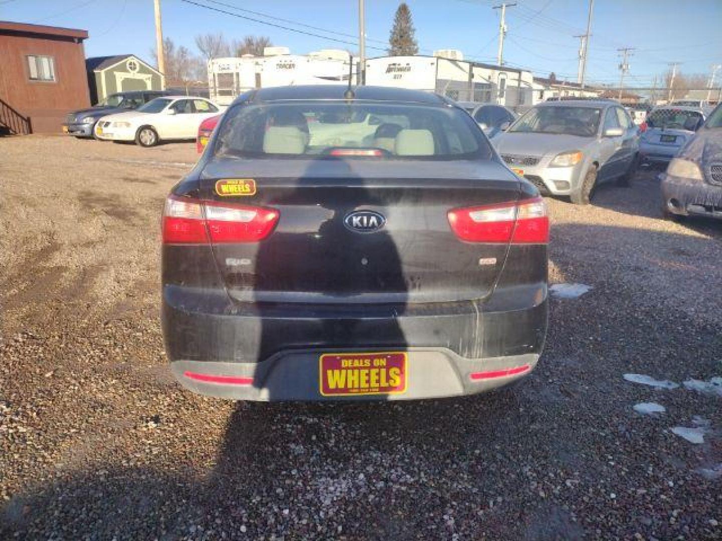 2013 Aurora Black Pearl Kia Rio LX (KNADM4A33D6) with an 1.6L L4 DOHC 16V engine, located at 4801 10th Ave S,, Great Falls, MT, 59405, 0.000000, 0.000000 - Photo#3