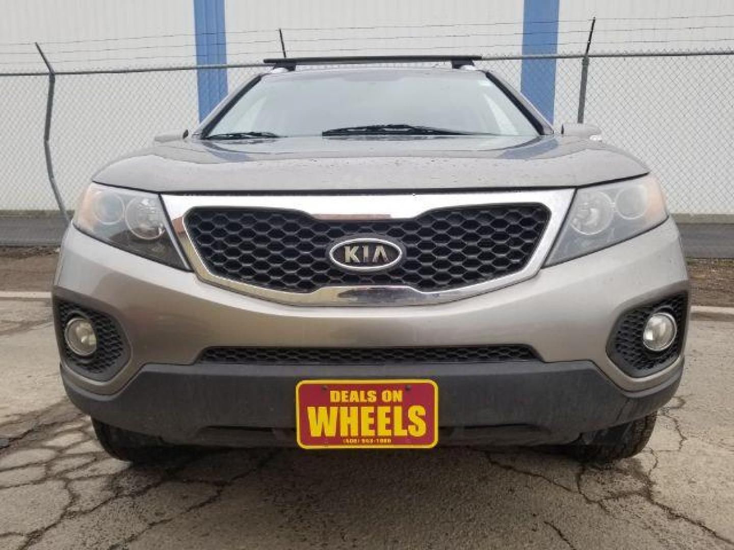 2013 Kia Sorento LX 4WD (5XYKTCA67DG) with an 2.4L L4 DOHC 16V engine, 6-Speed Automatic transmission, located at 601 E. Idaho St., Kalispell, MT, 59901, 0.000000, 0.000000 - Photo#1