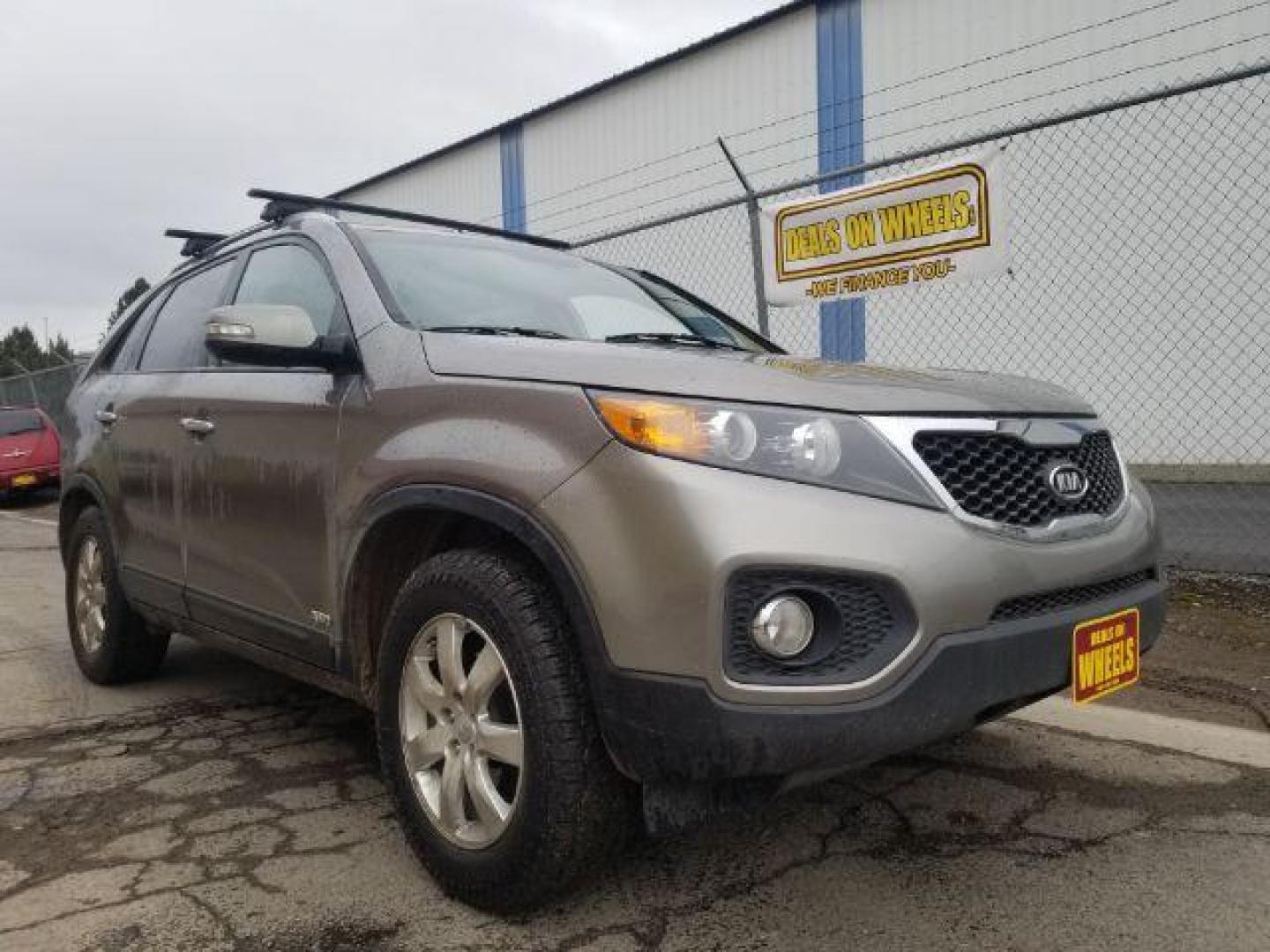 2013 Kia Sorento LX 4WD (5XYKTCA67DG) with an 2.4L L4 DOHC 16V engine, 6-Speed Automatic transmission, located at 601 E. Idaho St., Kalispell, MT, 59901, 0.000000, 0.000000 - Photo#2