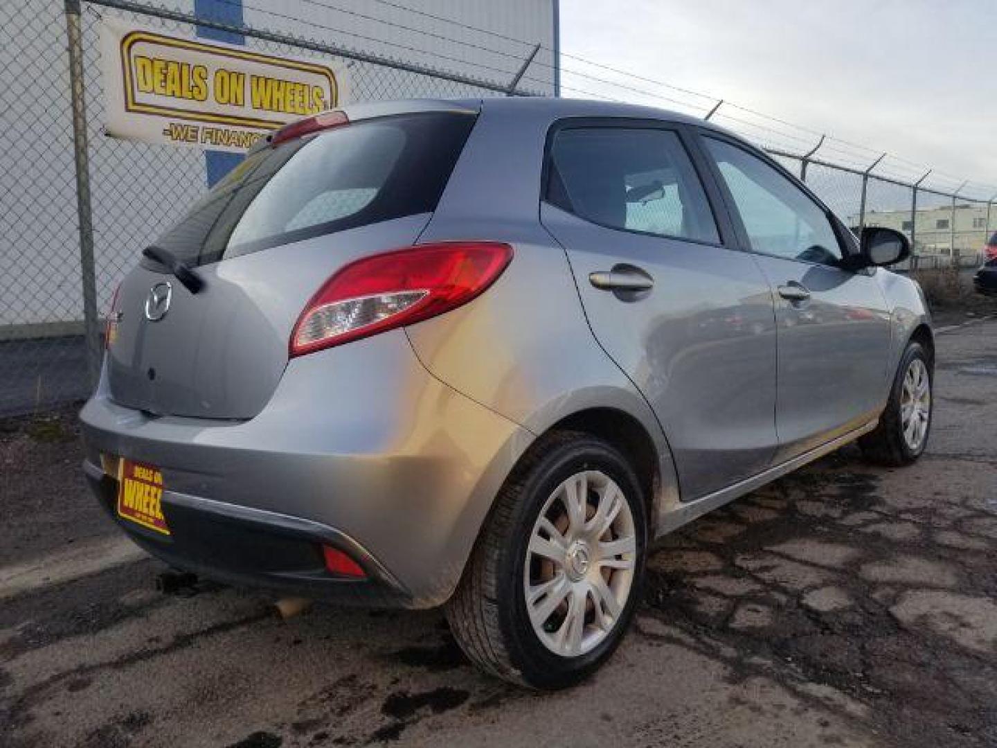 2013 Liquid Silver Metall Mazda MAZDA2 Sport (JM1DE1KY6D0) with an 1.5L L4 DOHC 16V engine, located at 1800 West Broadway, Missoula, 59808, (406) 543-1986, 46.881348, -114.023628 - Photo#4