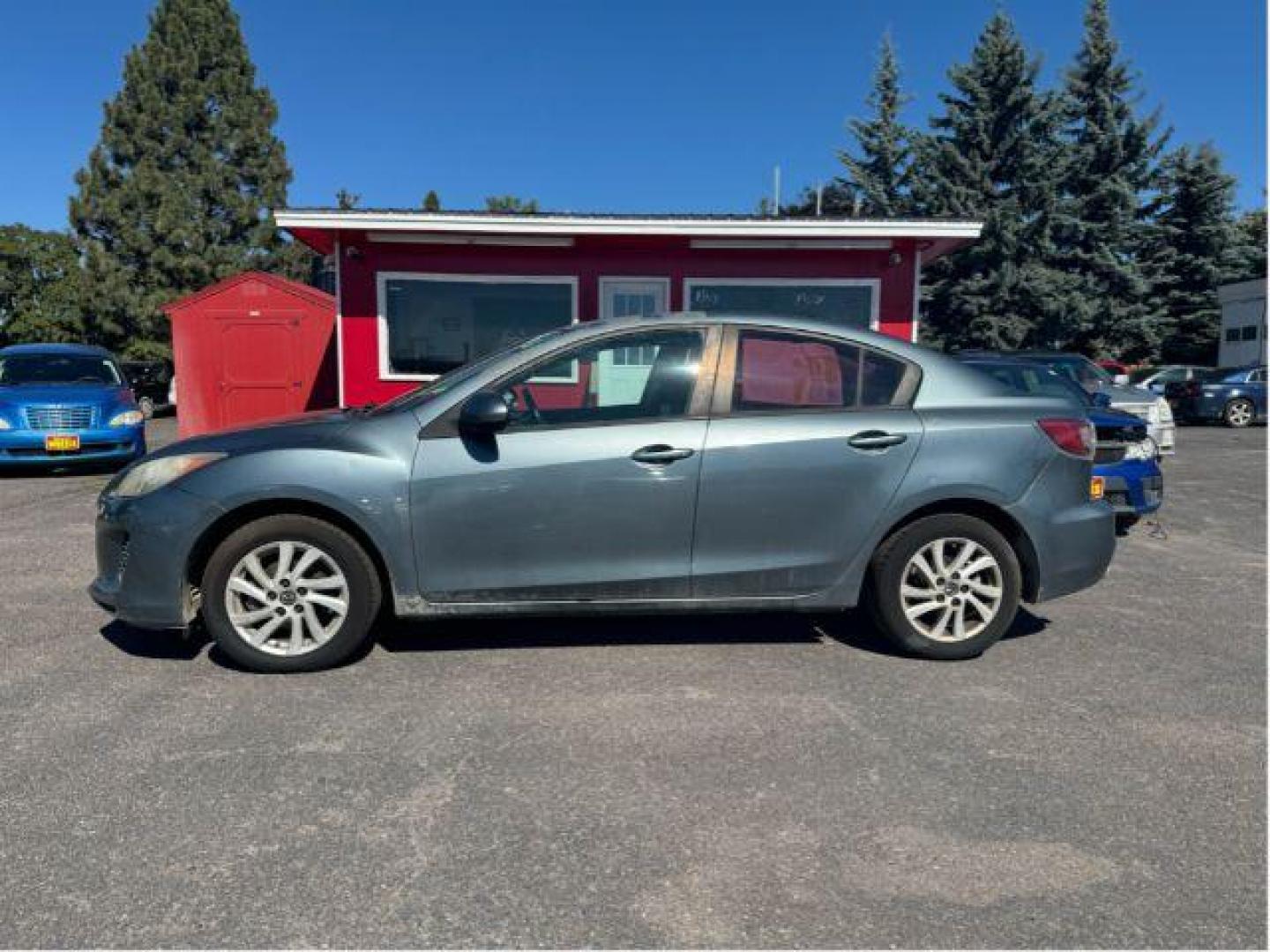 2013 Mazda MAZDA3 i SV MT 4-Door (JM1BL1TGXD1) with an 2.0L L4 DOHC 16V engine, 5-Speed Manual transmission, located at 601 E. Idaho St., Kalispell, MT, 59901, 0.000000, 0.000000 - Photo#1