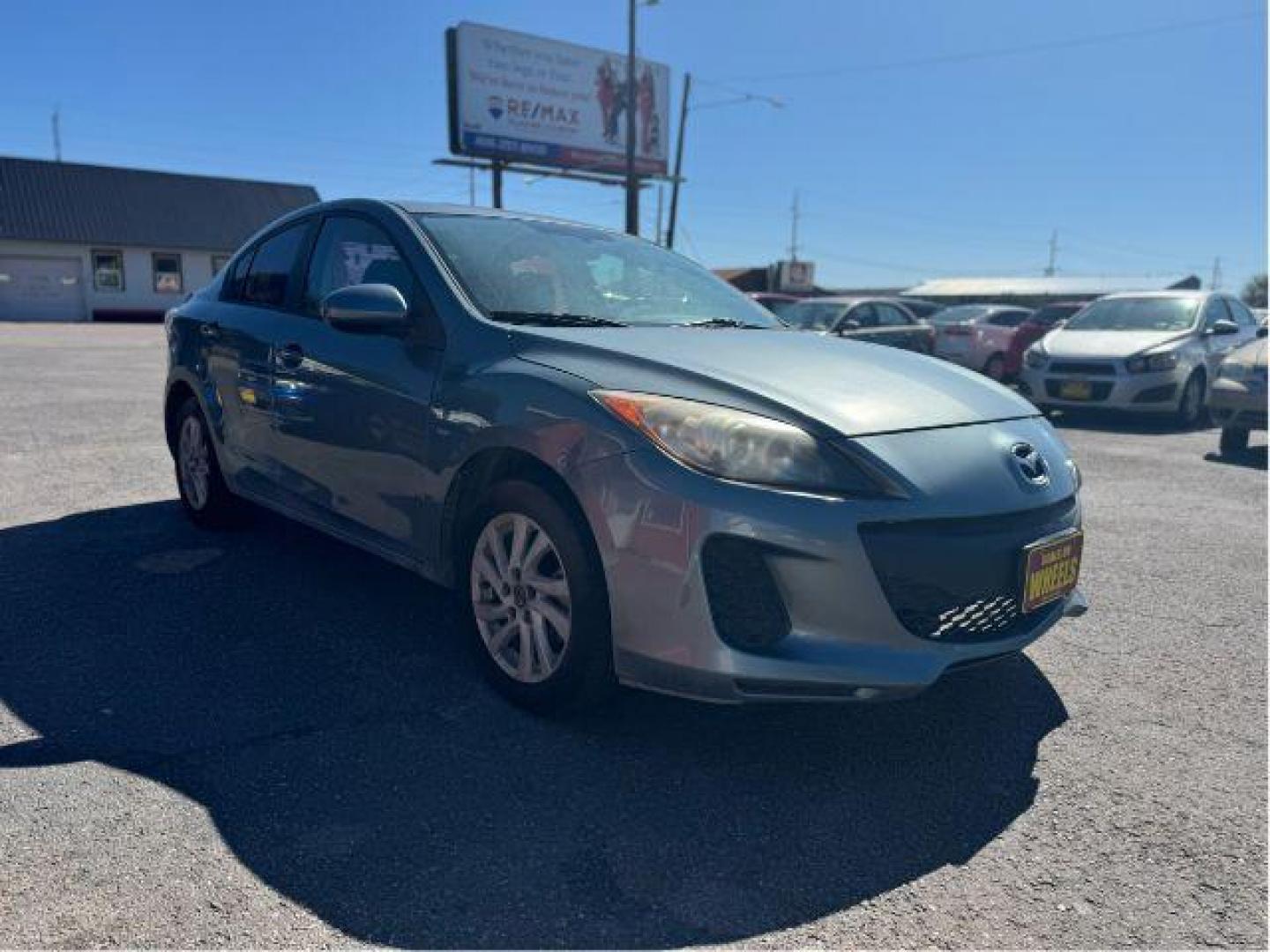 2013 Mazda MAZDA3 i SV MT 4-Door (JM1BL1TGXD1) with an 2.0L L4 DOHC 16V engine, 5-Speed Manual transmission, located at 601 E. Idaho St., Kalispell, MT, 59901, 0.000000, 0.000000 - Photo#6