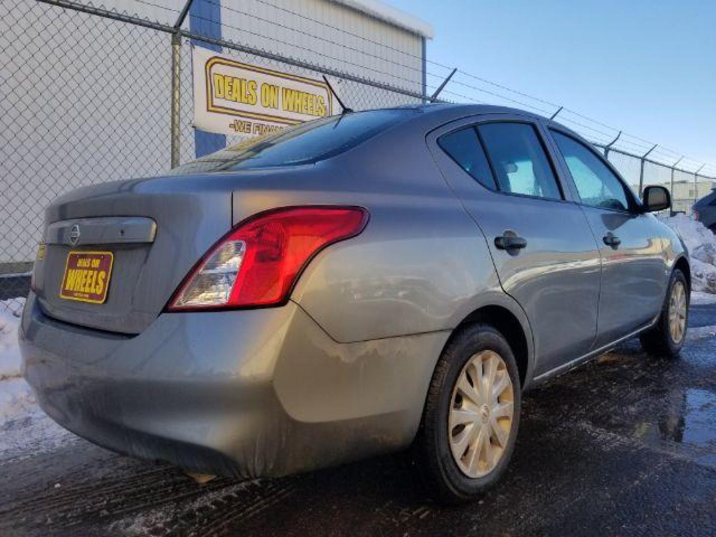 2013 Nissan Versa 1.6 S 5M (3N1CN7AP9DL) with an 1.6L L4 DOHC 16V engine, 5-Speed Manual transmission, located at 1800 West Broadway, Missoula, 59808, (406) 543-1986, 46.881348, -114.023628 - Photo#4