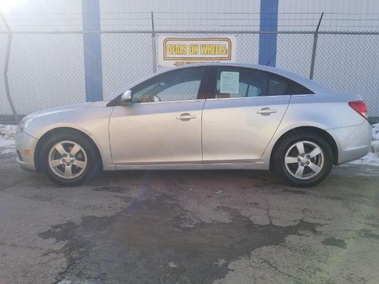 2014 Chevrolet Cruze 1LT Auto (1G1PC5SB5E7) with an 1.4L L4 DOHC 16V TURBO engine, 6-Speed Automatic transmission, located at 4047 Montana Ave., Billings, MT, 59101, 45.770847, -108.529800 - Photo#6